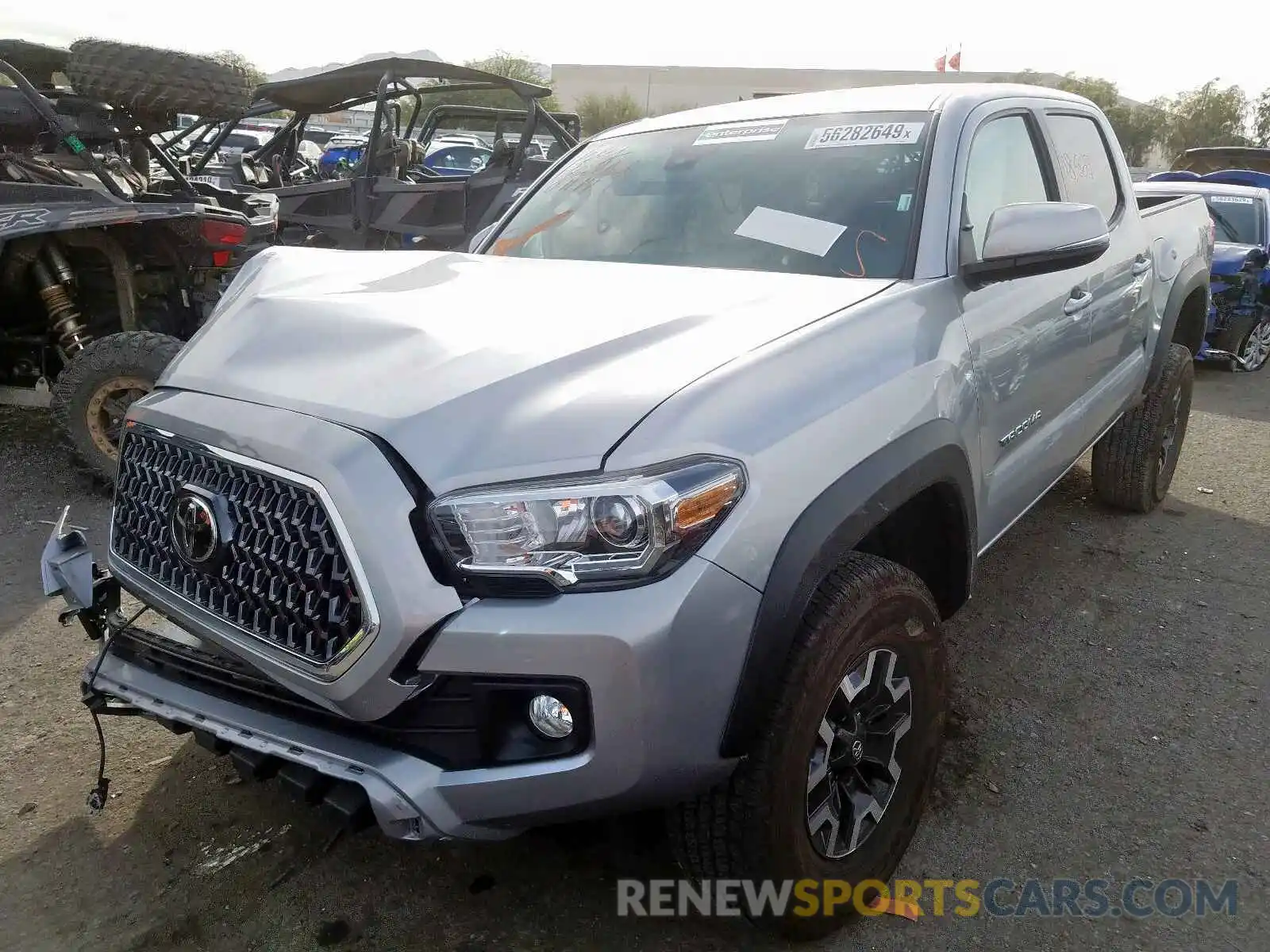 2 Photograph of a damaged car 3TMAZ5CNXKM096654 TOYOTA TACOMA DOU 2019