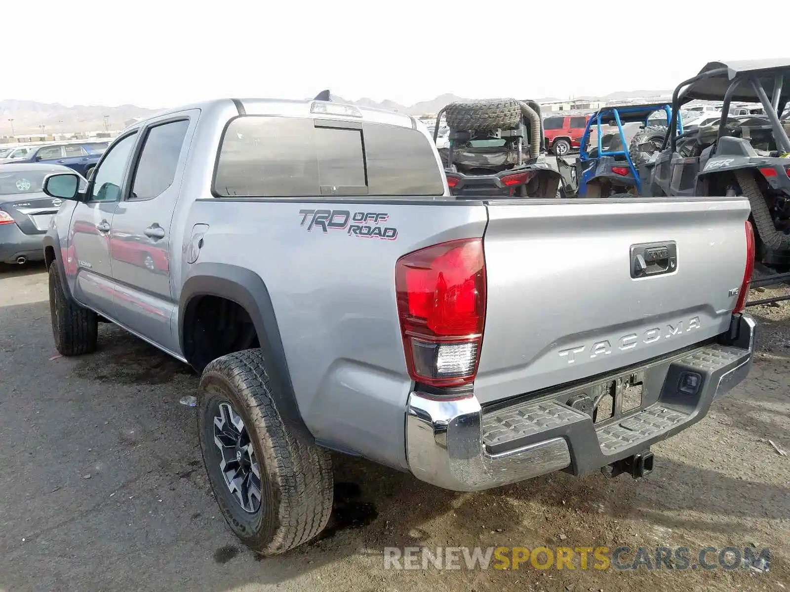 3 Photograph of a damaged car 3TMAZ5CNXKM096654 TOYOTA TACOMA DOU 2019