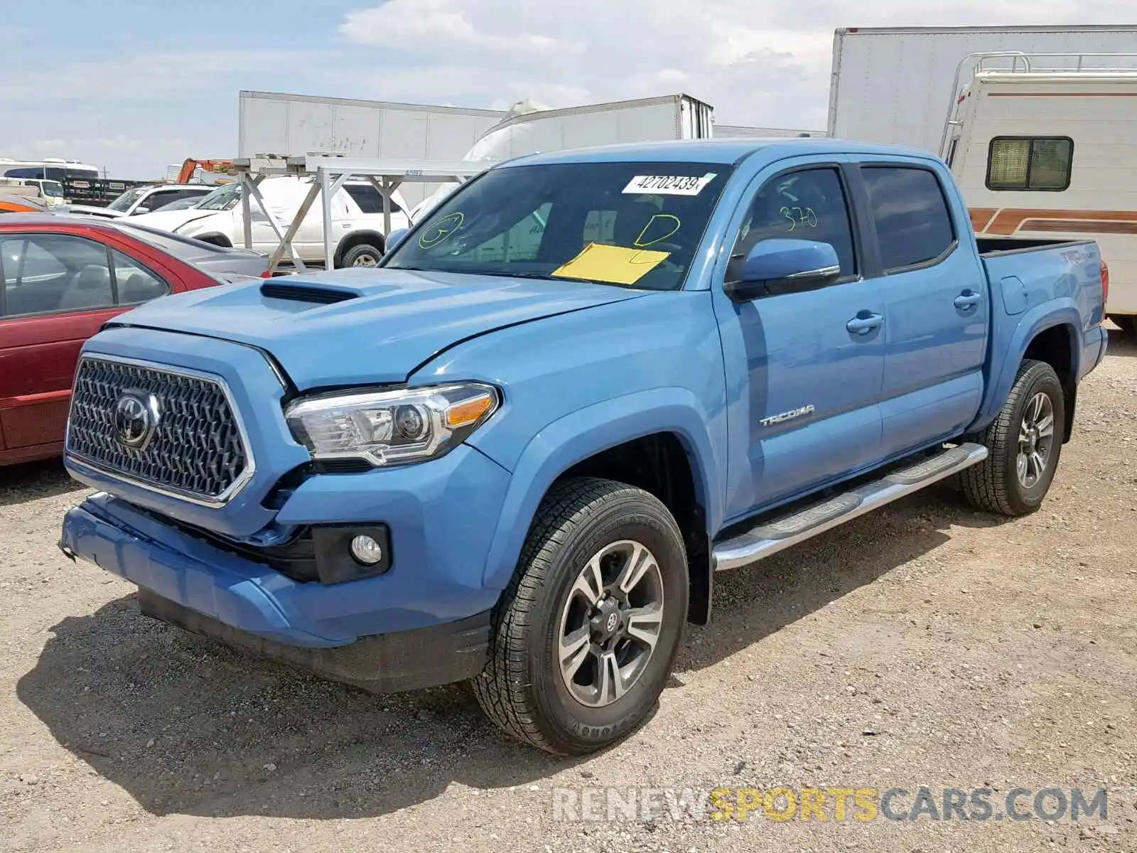 2 Photograph of a damaged car 3TMAZ5CNXKM102355 TOYOTA TACOMA DOU 2019