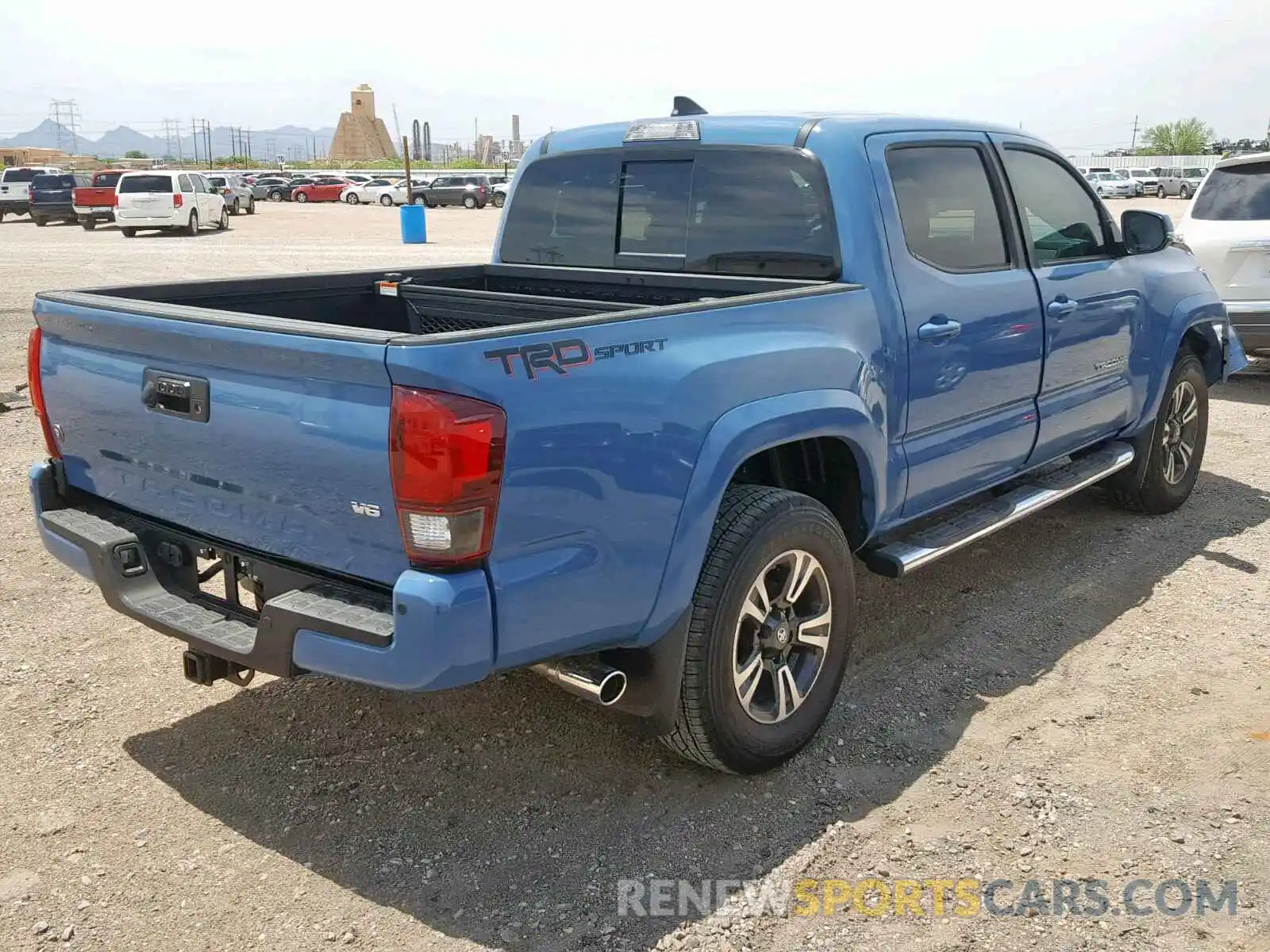 4 Photograph of a damaged car 3TMAZ5CNXKM102355 TOYOTA TACOMA DOU 2019