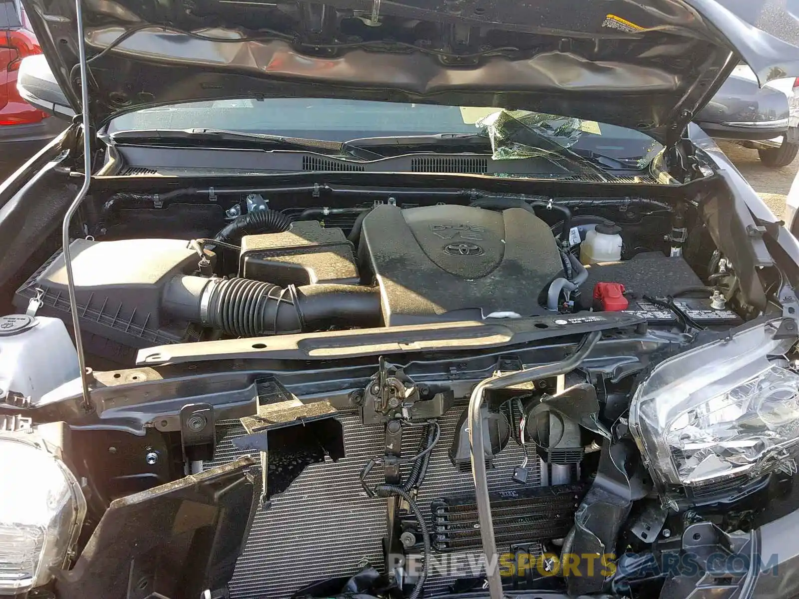 7 Photograph of a damaged car 3TMBZ5DN0KM018533 TOYOTA TACOMA DOU 2019