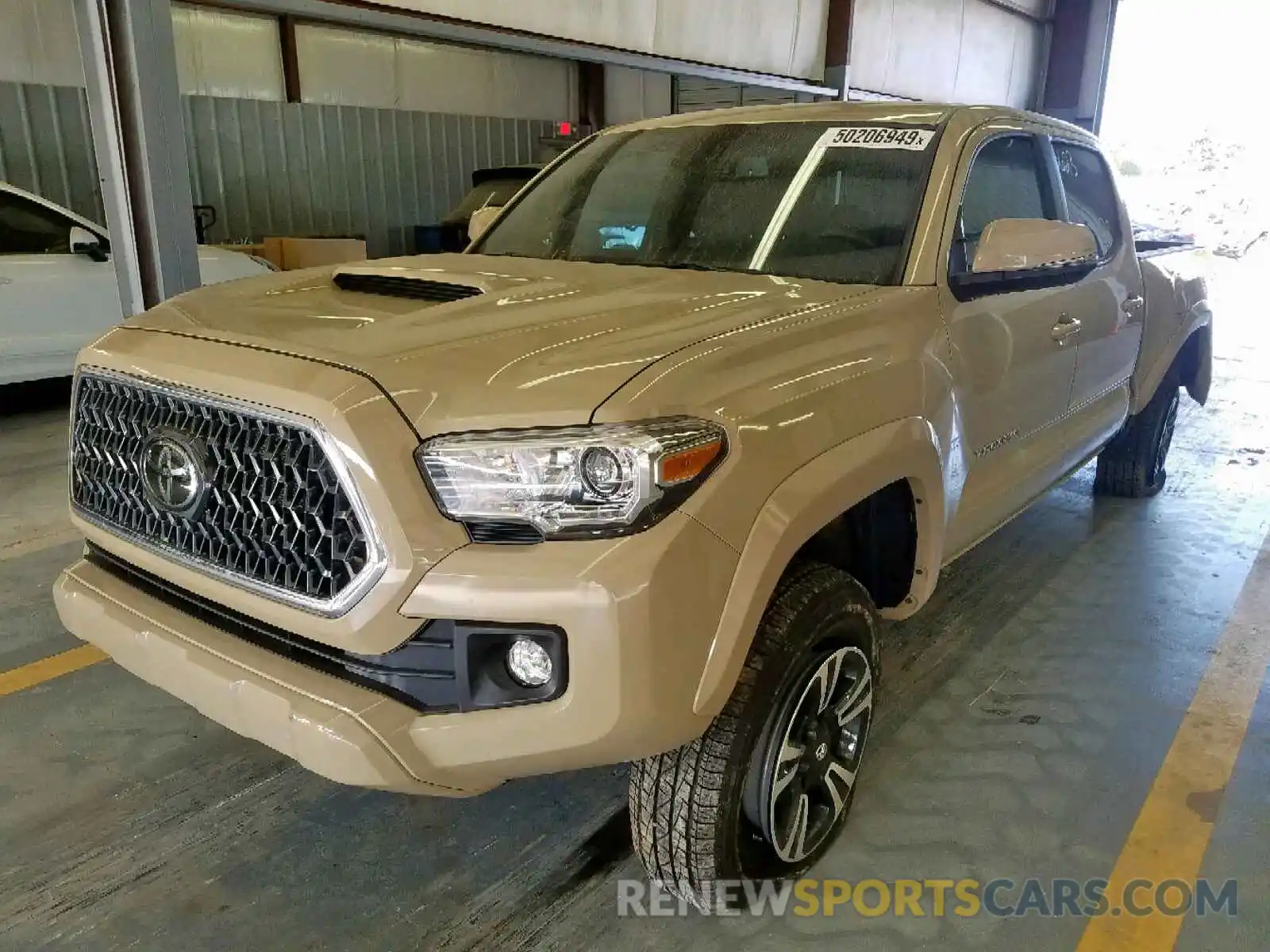 2 Photograph of a damaged car 3TMBZ5DN7KM017380 TOYOTA TACOMA DOU 2019