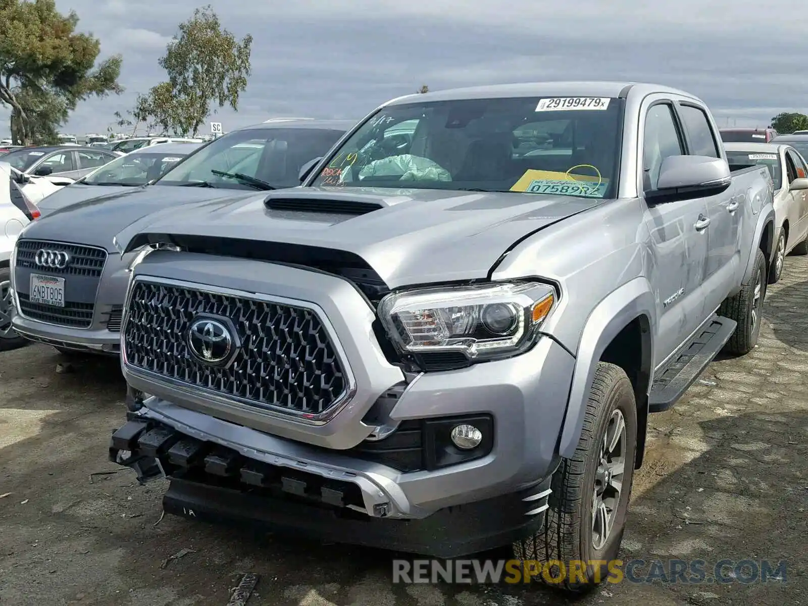 2 Photograph of a damaged car 3TMBZ5DN8KM018022 TOYOTA TACOMA DOU 2019