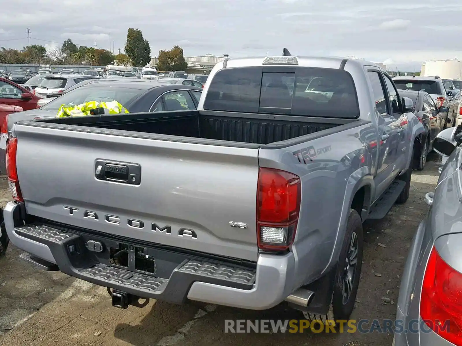 4 Photograph of a damaged car 3TMBZ5DN8KM018022 TOYOTA TACOMA DOU 2019