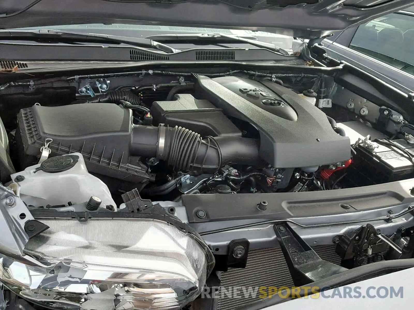 7 Photograph of a damaged car 3TMBZ5DN8KM018022 TOYOTA TACOMA DOU 2019