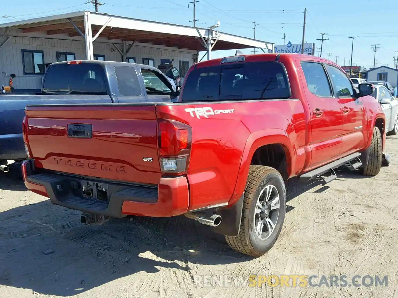 4 Photograph of a damaged car 3TMBZ5DN8KM021311 TOYOTA TACOMA DOU 2019