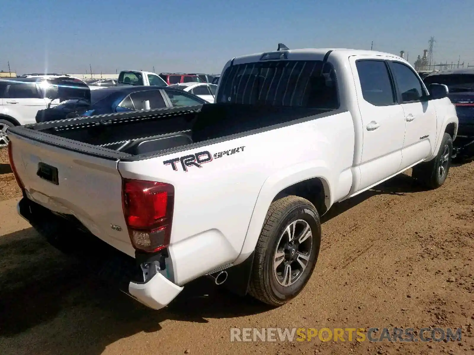 4 Photograph of a damaged car 3TMBZ5DN8KM021471 TOYOTA TACOMA DOU 2019