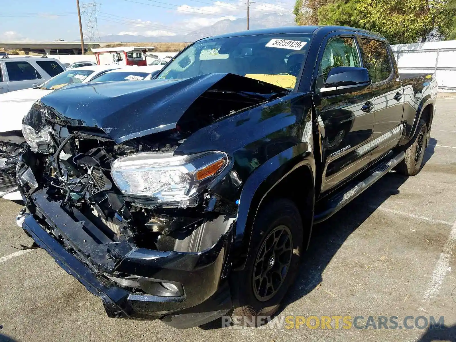 2 Photograph of a damaged car 3TMBZ5DN9KM019115 TOYOTA TACOMA DOU 2019