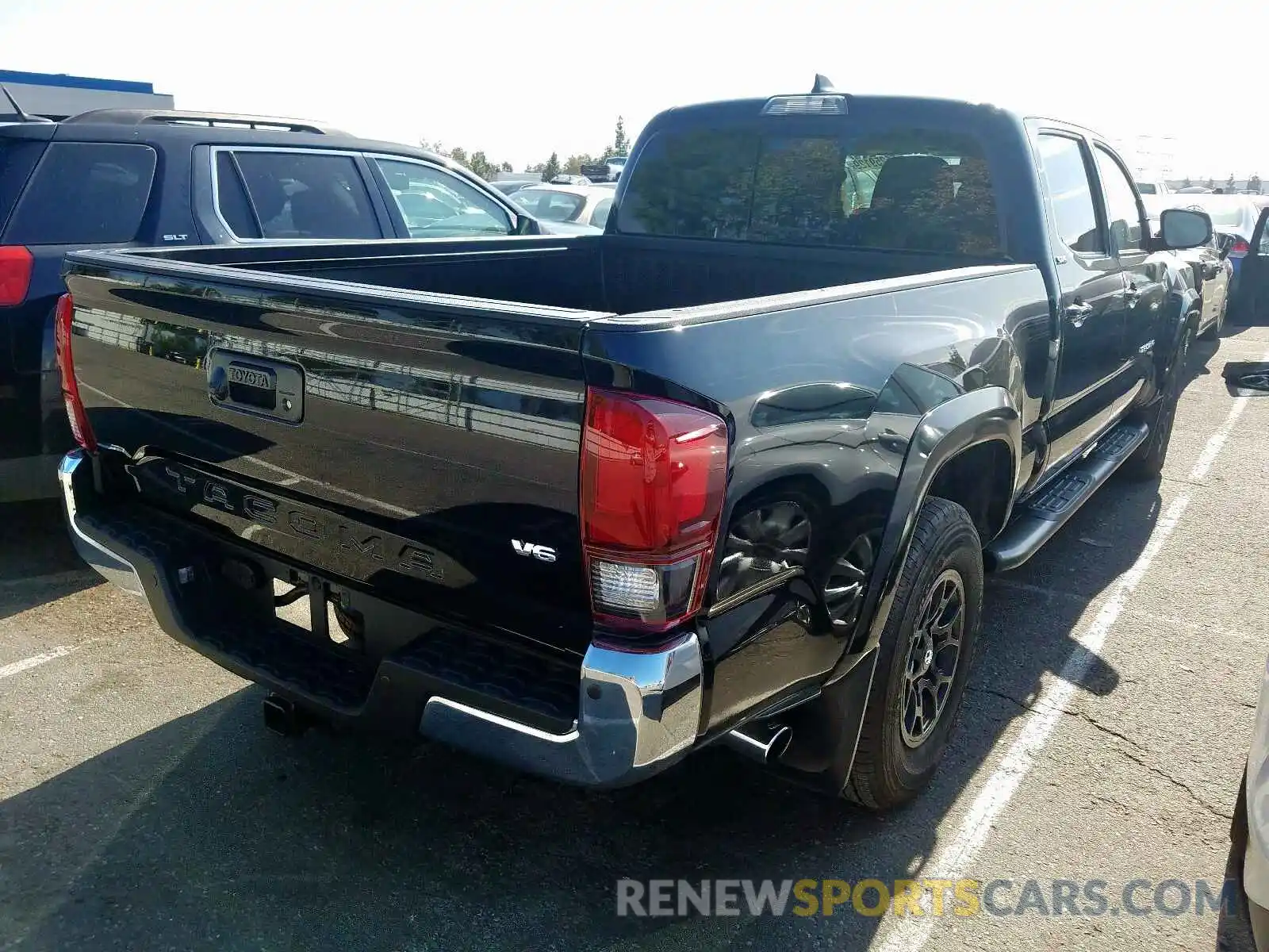 4 Photograph of a damaged car 3TMBZ5DN9KM019115 TOYOTA TACOMA DOU 2019