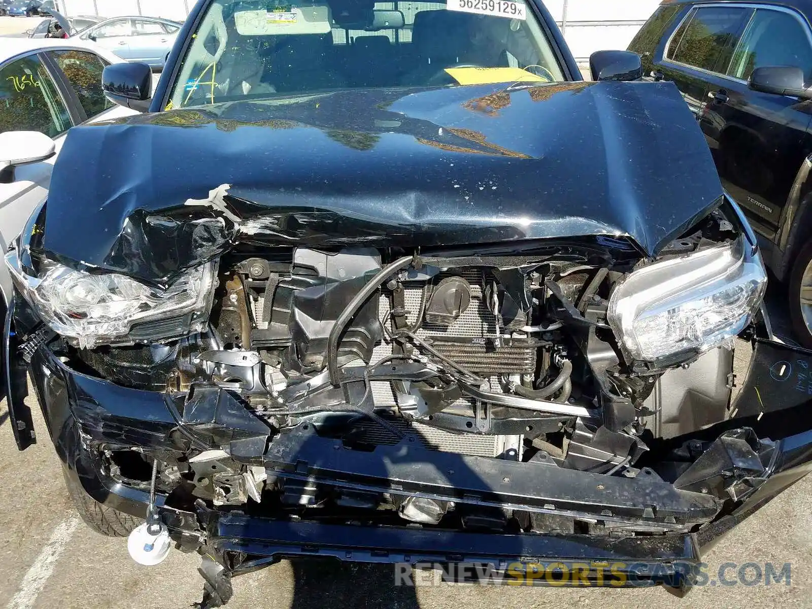 7 Photograph of a damaged car 3TMBZ5DN9KM019115 TOYOTA TACOMA DOU 2019