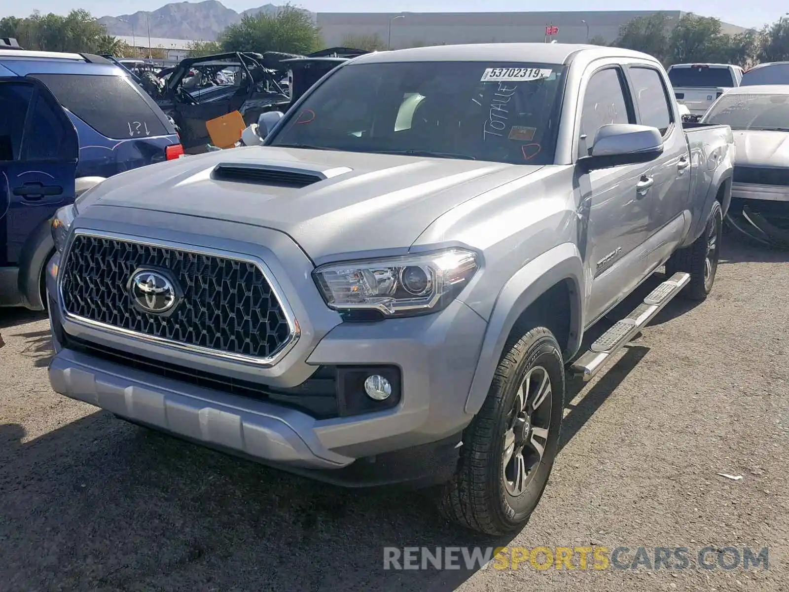 2 Photograph of a damaged car 3TMBZ5DNXKM020046 TOYOTA TACOMA DOU 2019