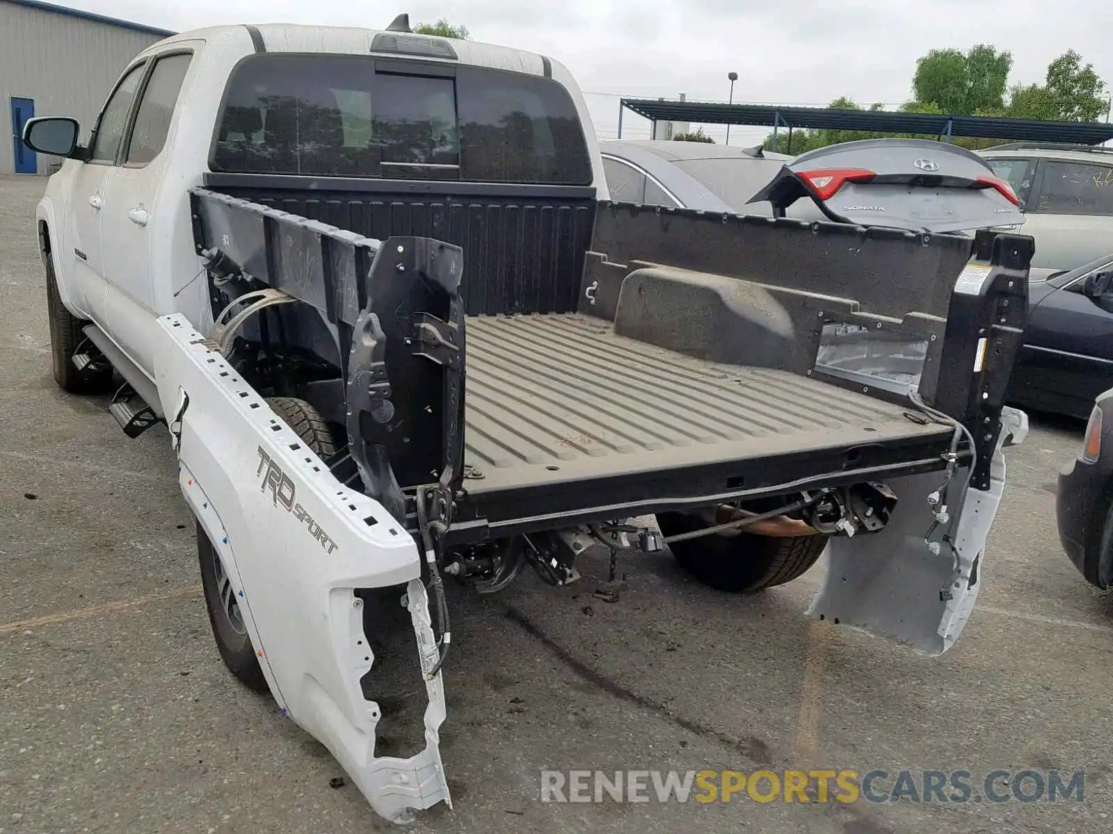 3 Photograph of a damaged car 3TMBZ5DNXKM020953 TOYOTA TACOMA DOU 2019