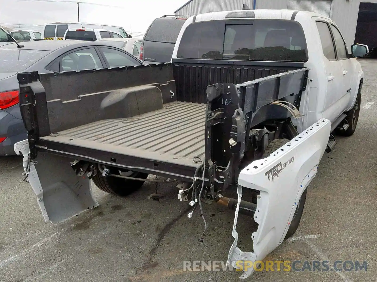 4 Photograph of a damaged car 3TMBZ5DNXKM020953 TOYOTA TACOMA DOU 2019