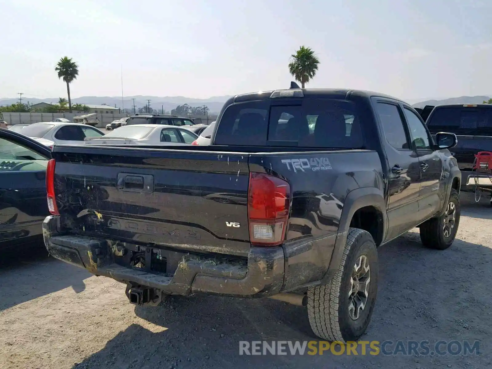 4 Photograph of a damaged car 3TMCZ5AN0KM198279 TOYOTA TACOMA DOU 2019