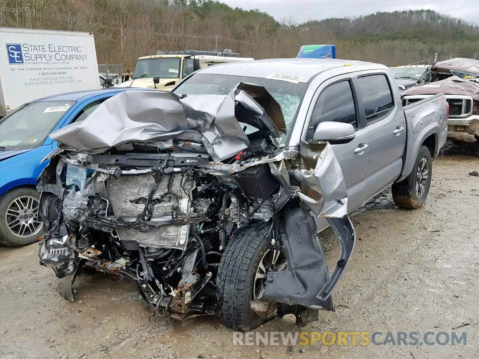 2 Photograph of a damaged car 3TMCZ5AN0KM201651 TOYOTA TACOMA DOU 2019