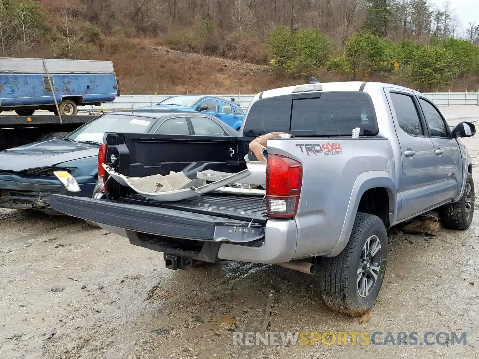 4 Photograph of a damaged car 3TMCZ5AN0KM201651 TOYOTA TACOMA DOU 2019