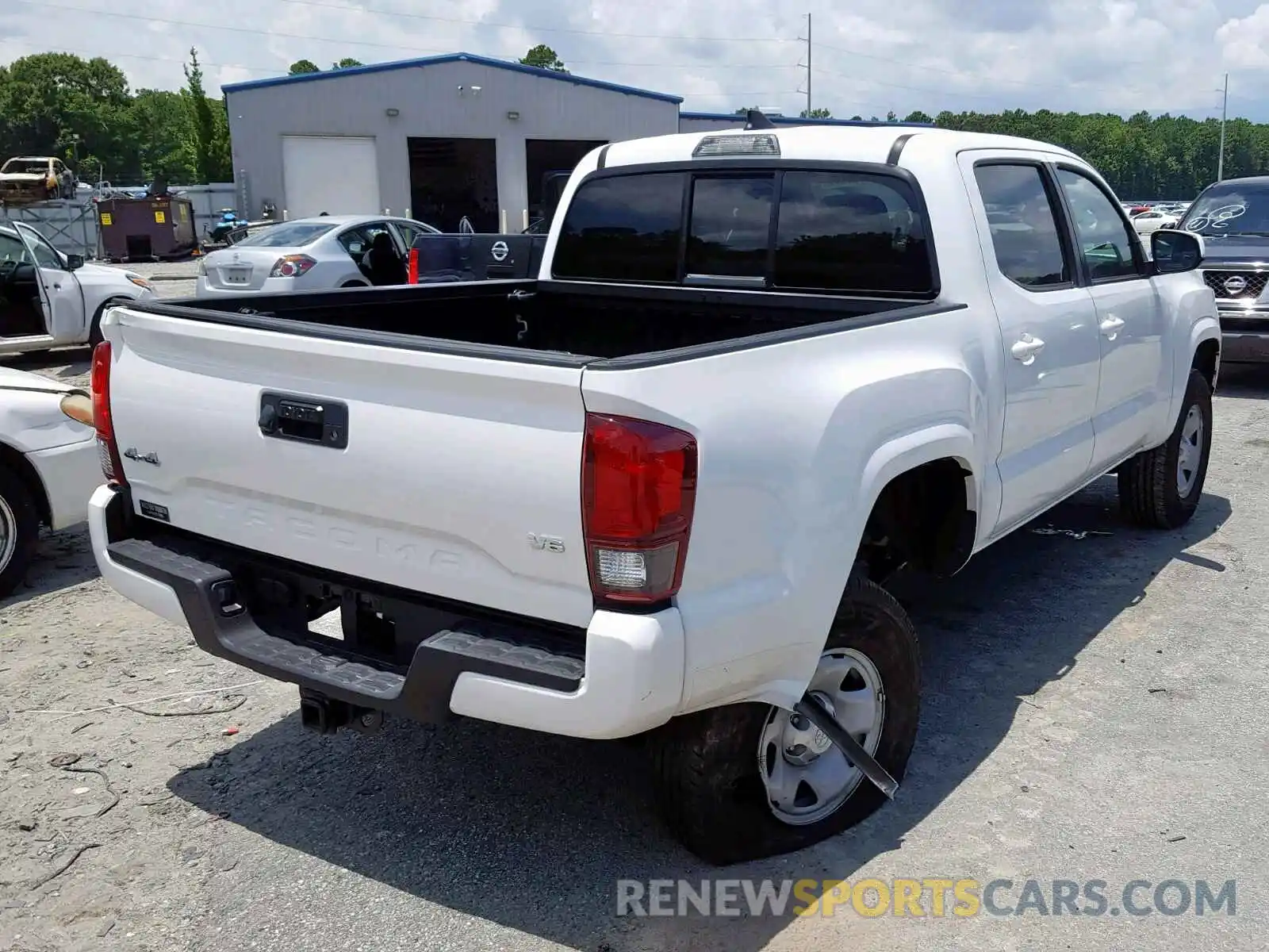 4 Photograph of a damaged car 3TMCZ5AN0KM230986 TOYOTA TACOMA DOU 2019