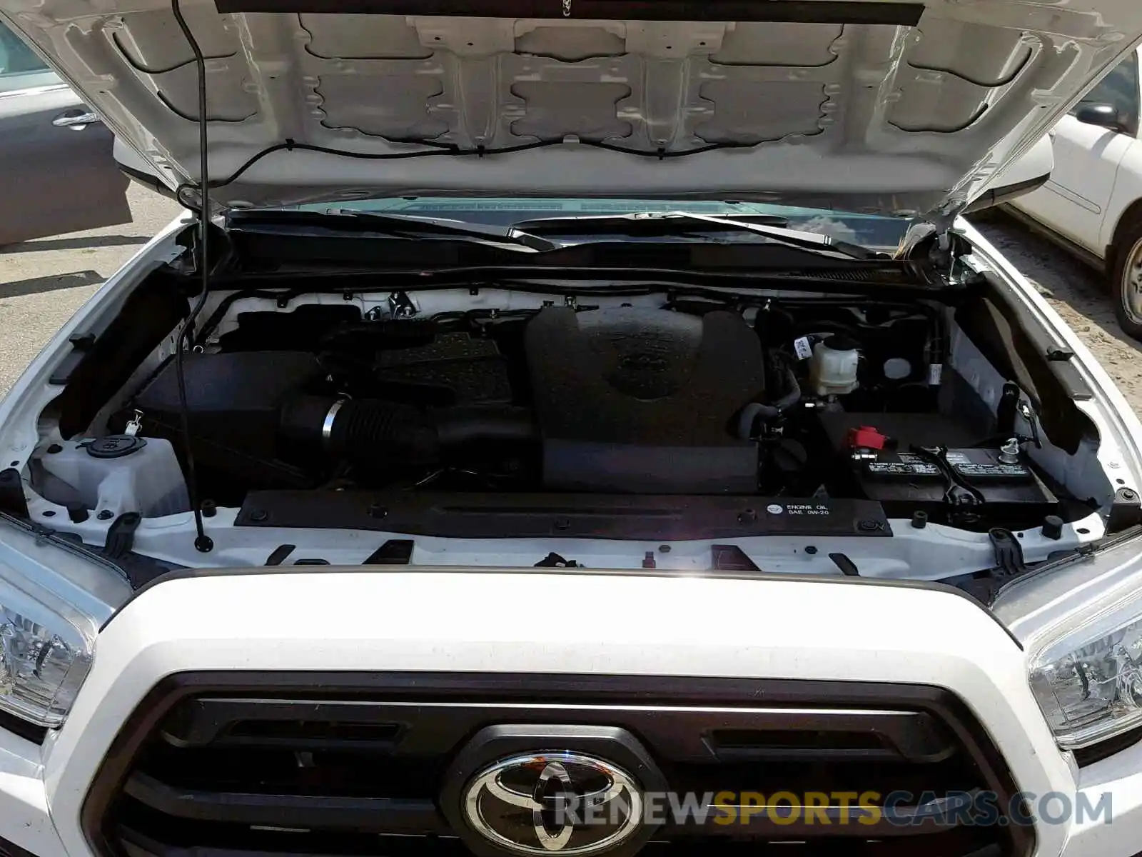 7 Photograph of a damaged car 3TMCZ5AN0KM230986 TOYOTA TACOMA DOU 2019