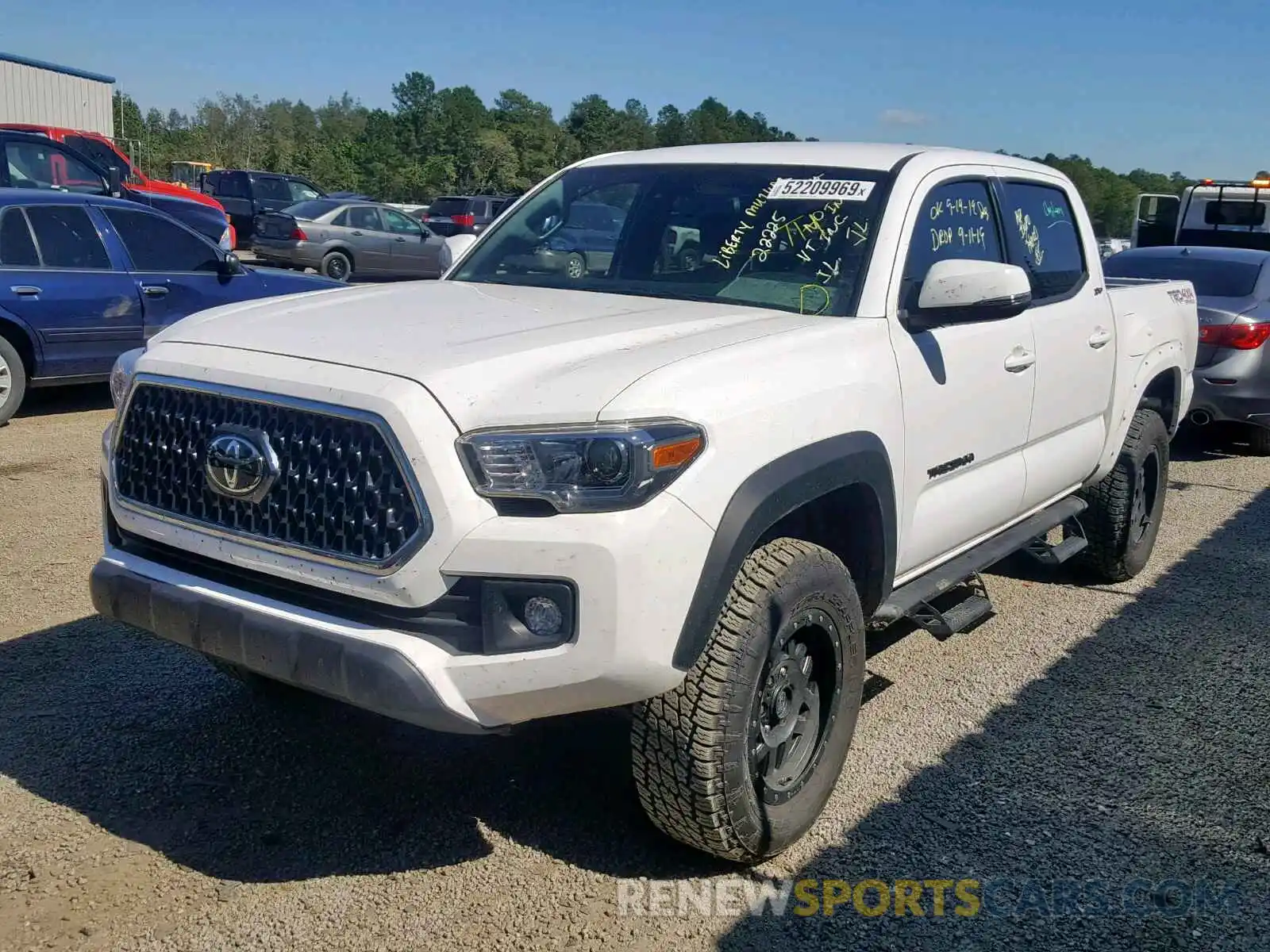 2 Photograph of a damaged car 3TMCZ5AN0KM262871 TOYOTA TACOMA DOU 2019