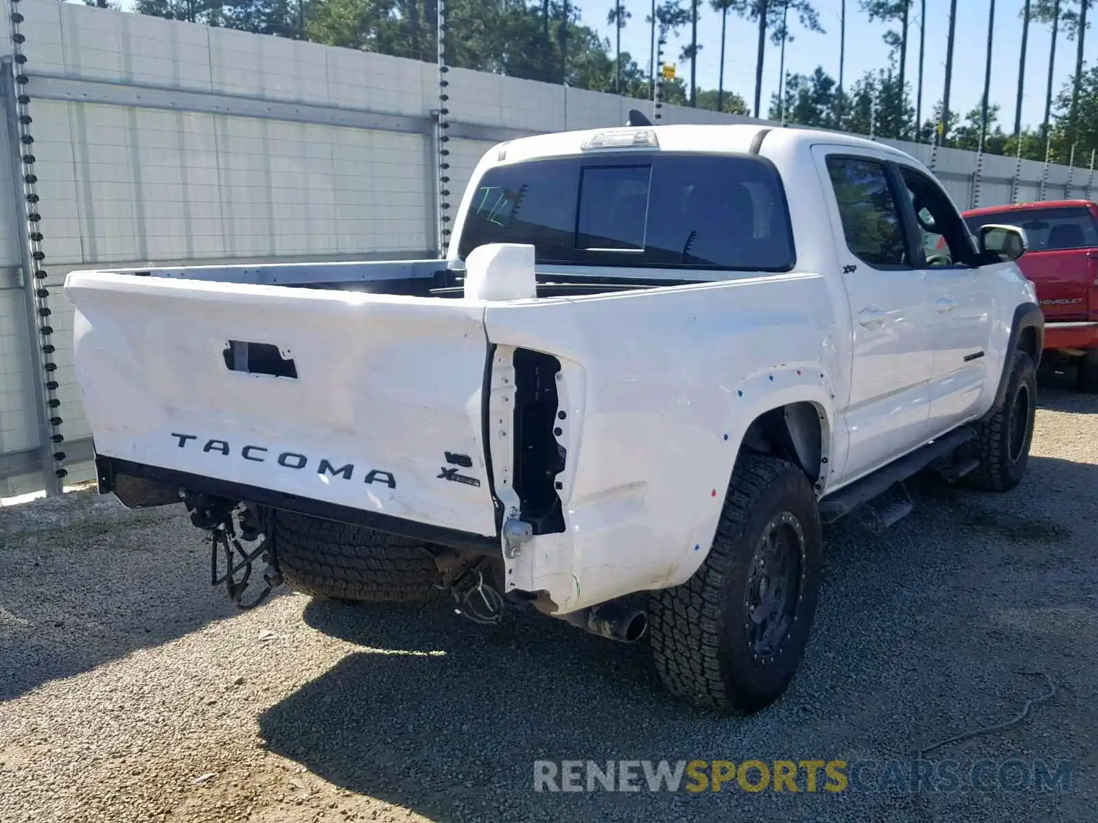 4 Photograph of a damaged car 3TMCZ5AN0KM262871 TOYOTA TACOMA DOU 2019