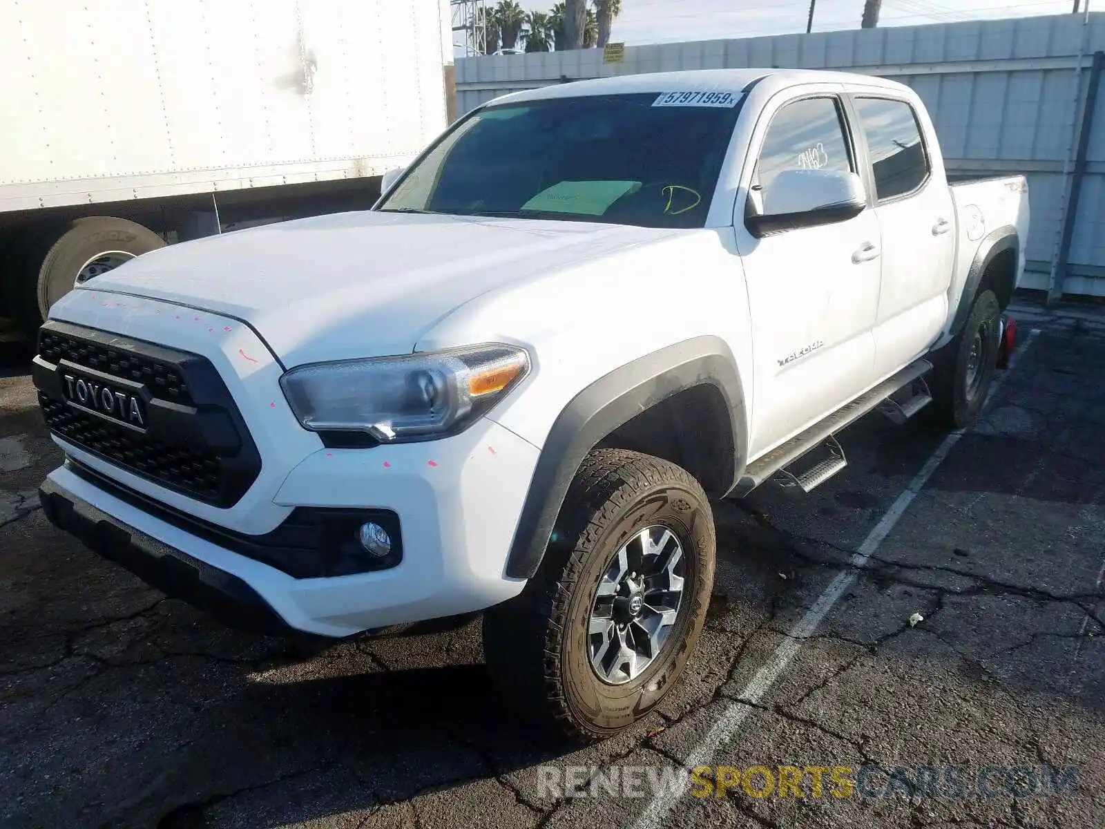 2 Photograph of a damaged car 3TMCZ5AN1KM194399 TOYOTA TACOMA DOU 2019