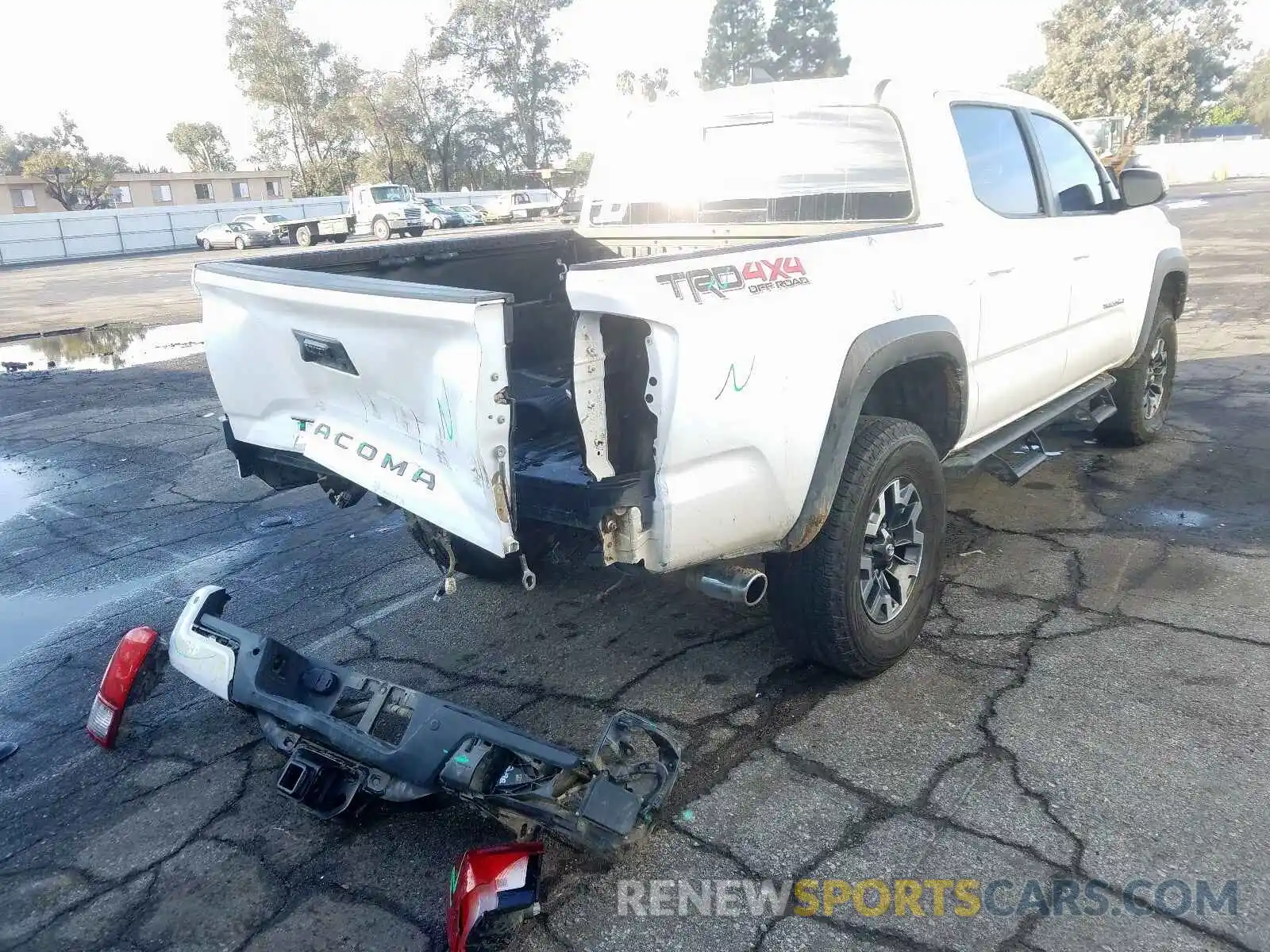 4 Photograph of a damaged car 3TMCZ5AN1KM194399 TOYOTA TACOMA DOU 2019