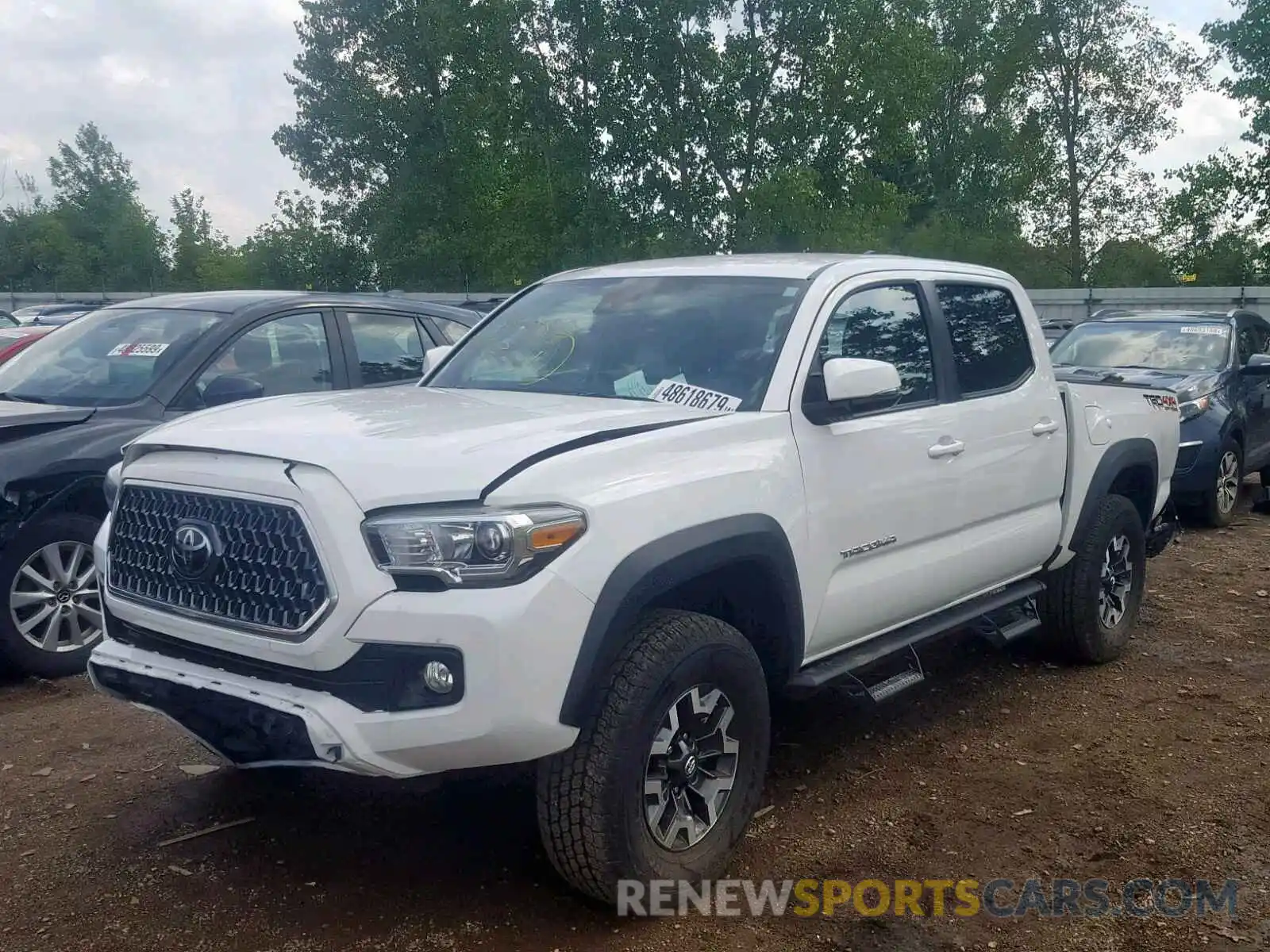 2 Photograph of a damaged car 3TMCZ5AN1KM201738 TOYOTA TACOMA DOU 2019