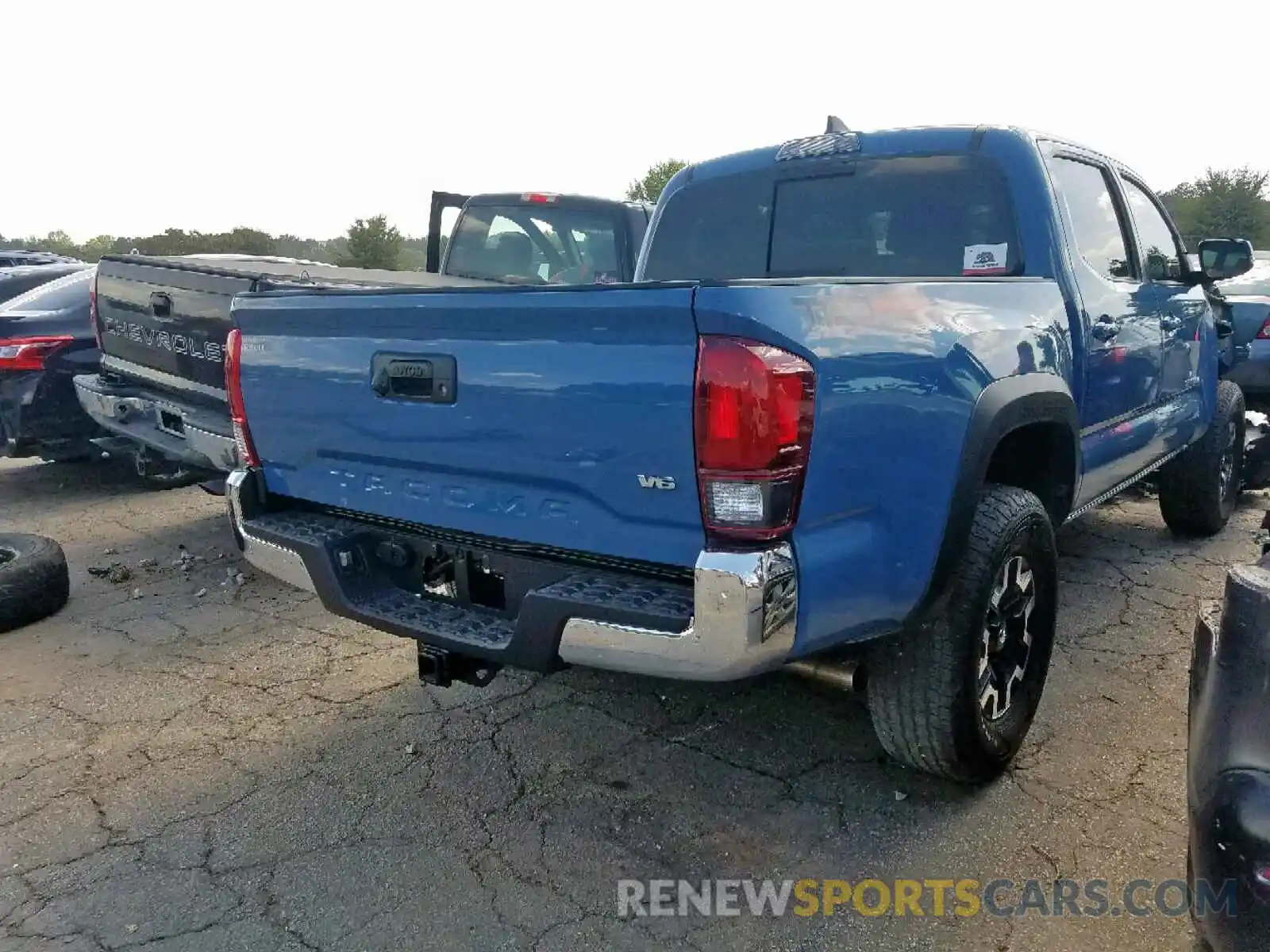 4 Photograph of a damaged car 3TMCZ5AN1KM204607 TOYOTA TACOMA DOU 2019