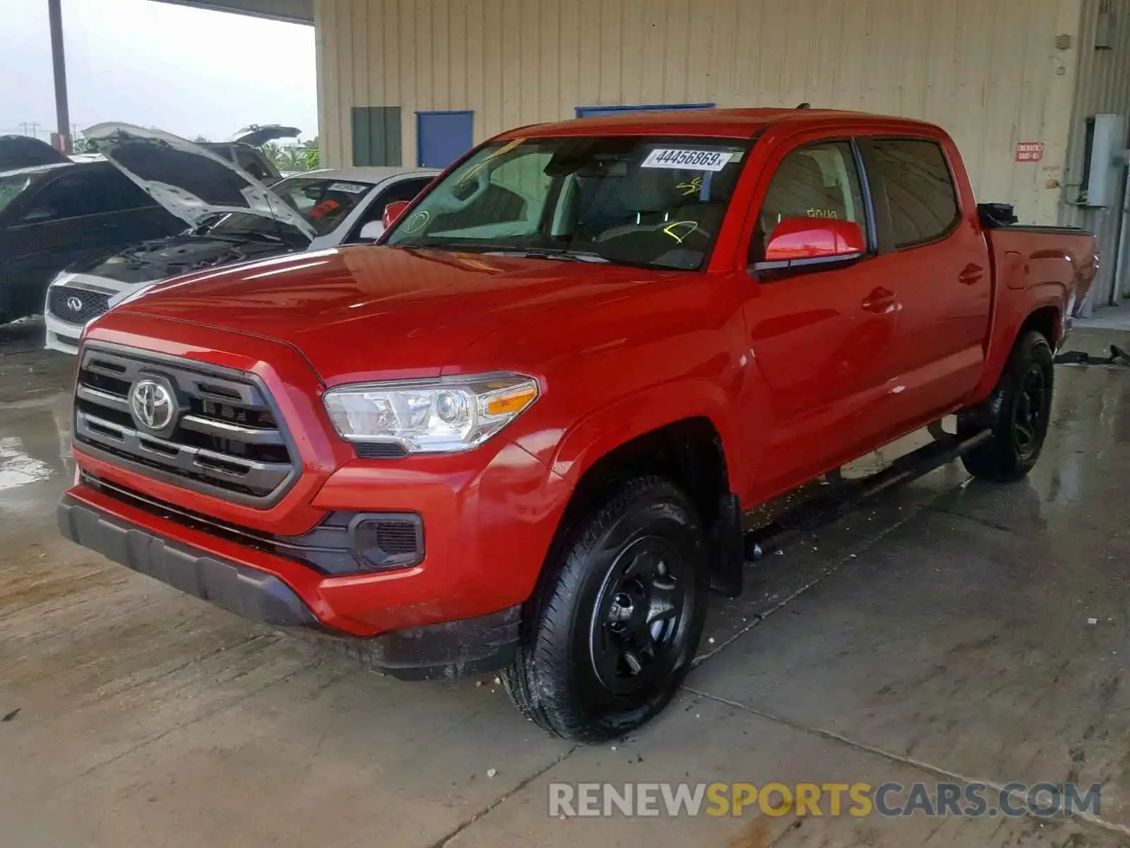 2 Photograph of a damaged car 3TMCZ5AN1KM215042 TOYOTA TACOMA DOU 2019