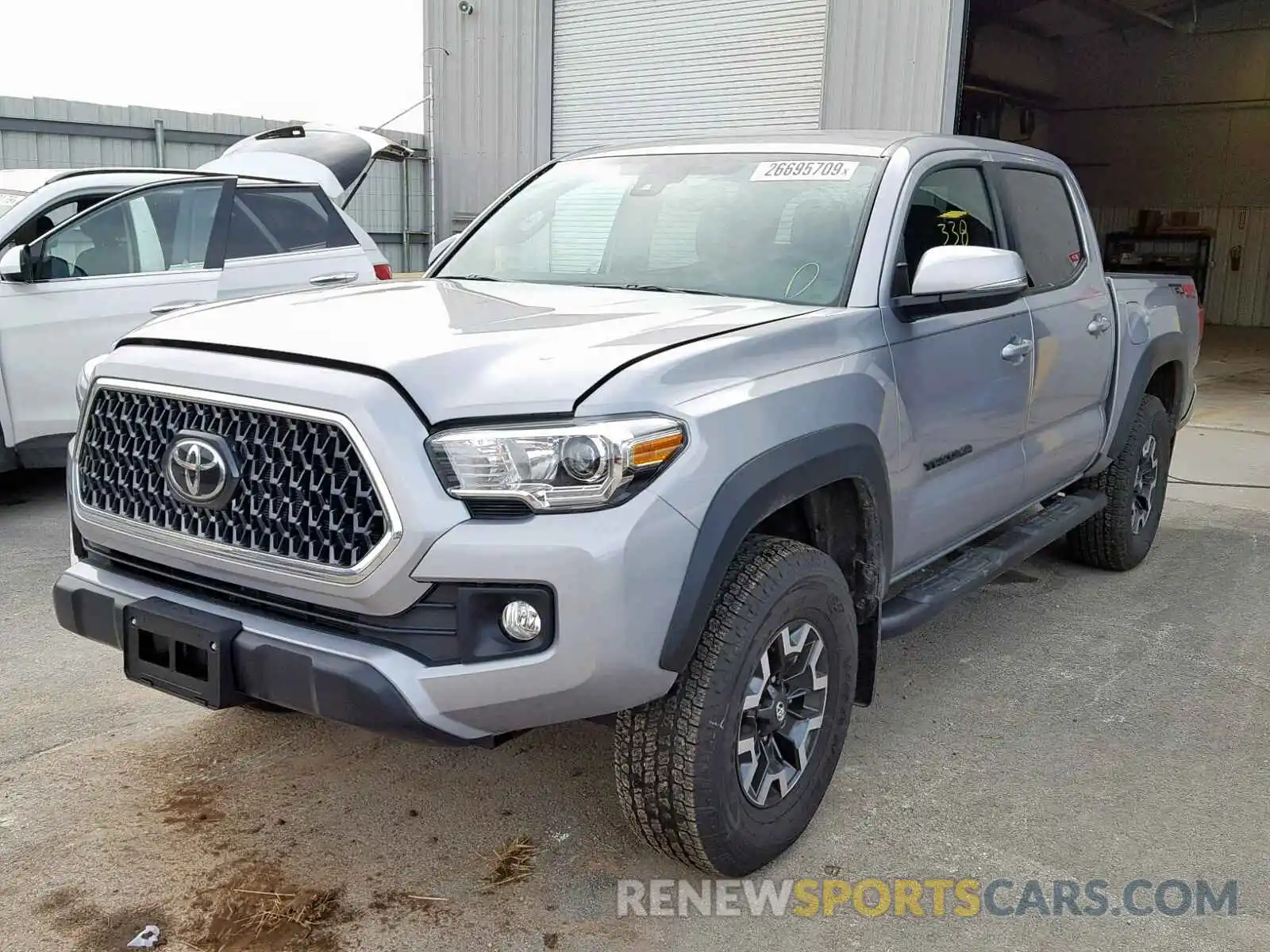 2 Photograph of a damaged car 3TMCZ5AN1KM216661 TOYOTA TACOMA DOU 2019