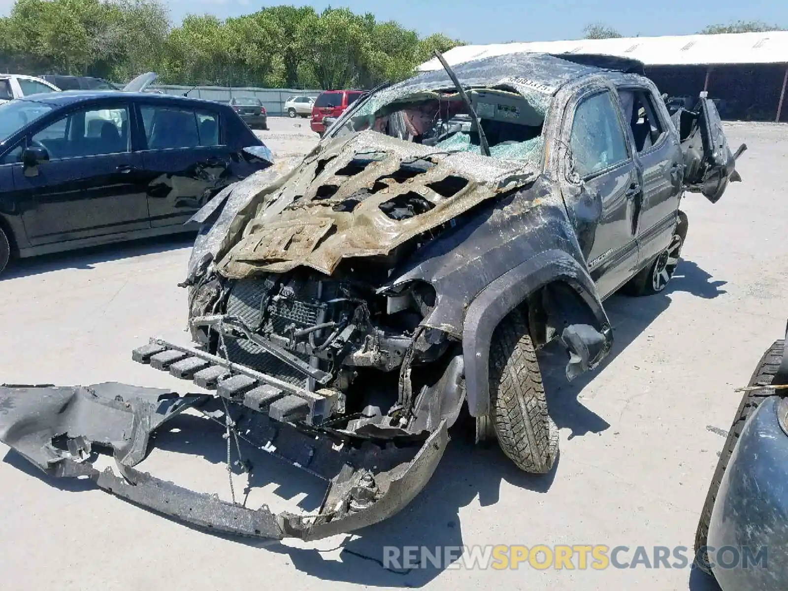 2 Photograph of a damaged car 3TMCZ5AN1KM226882 TOYOTA TACOMA DOU 2019