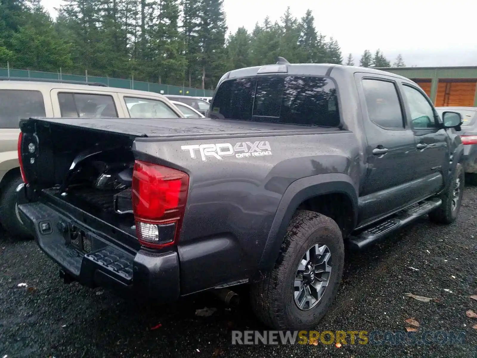 4 Photograph of a damaged car 3TMCZ5AN1KM228969 TOYOTA TACOMA DOU 2019