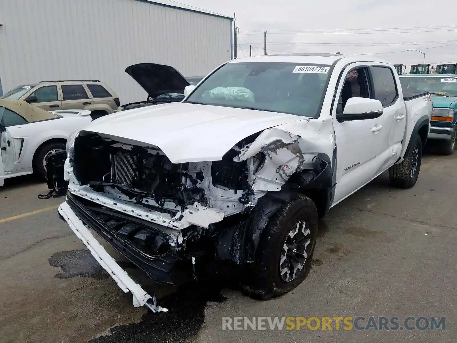 2 Photograph of a damaged car 3TMCZ5AN1KM238174 TOYOTA TACOMA DOU 2019