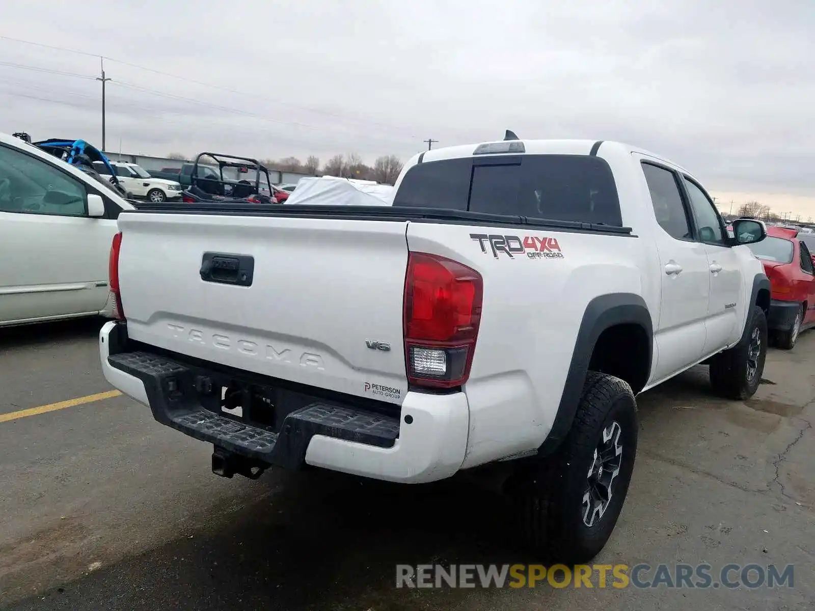 4 Photograph of a damaged car 3TMCZ5AN1KM238174 TOYOTA TACOMA DOU 2019