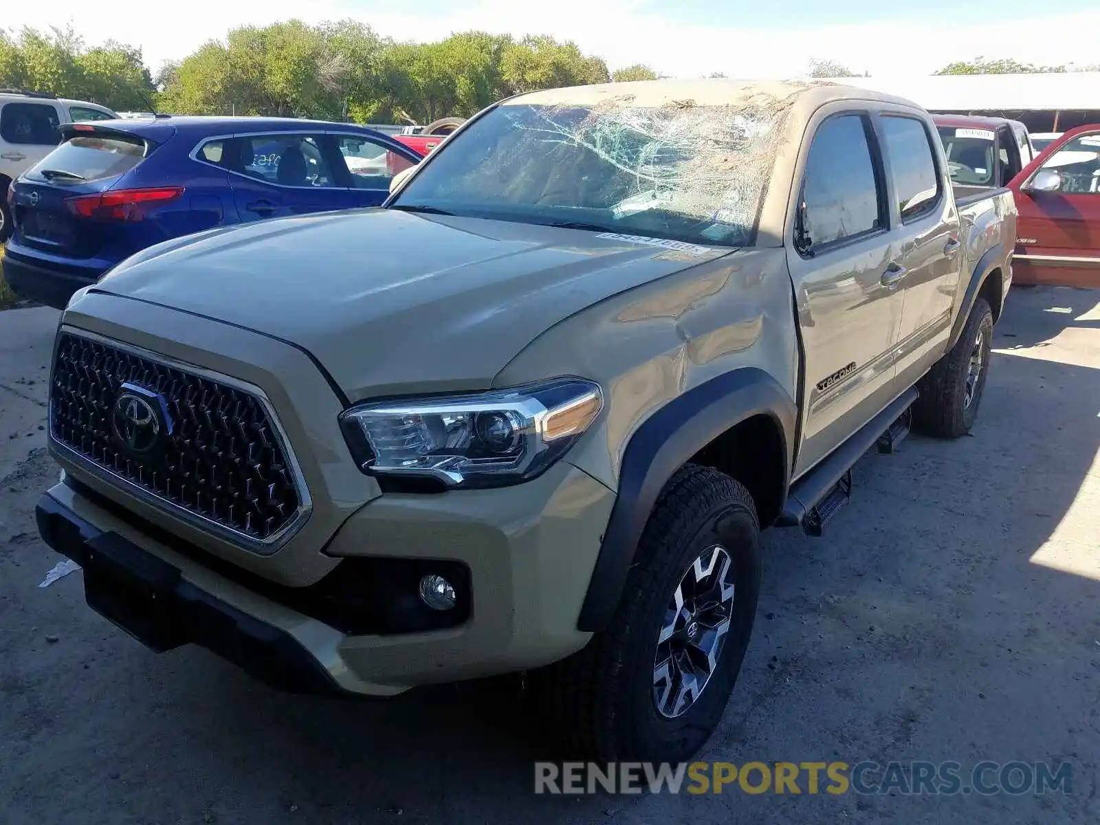 2 Photograph of a damaged car 3TMCZ5AN1KM256903 TOYOTA TACOMA DOU 2019