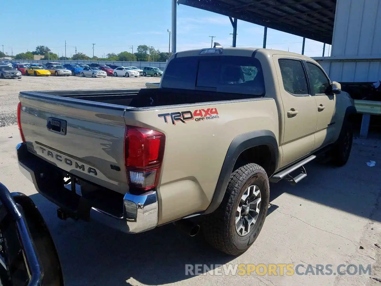 4 Photograph of a damaged car 3TMCZ5AN1KM256903 TOYOTA TACOMA DOU 2019