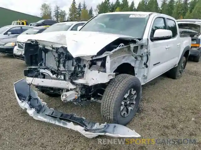 2 Photograph of a damaged car 3TMCZ5AN1KM266153 TOYOTA TACOMA DOU 2019