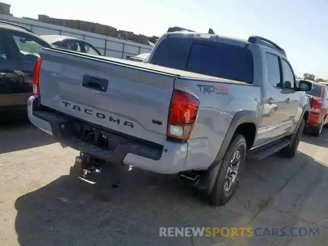 4 Photograph of a damaged car 3TMCZ5AN1KM272955 TOYOTA TACOMA DOU 2019