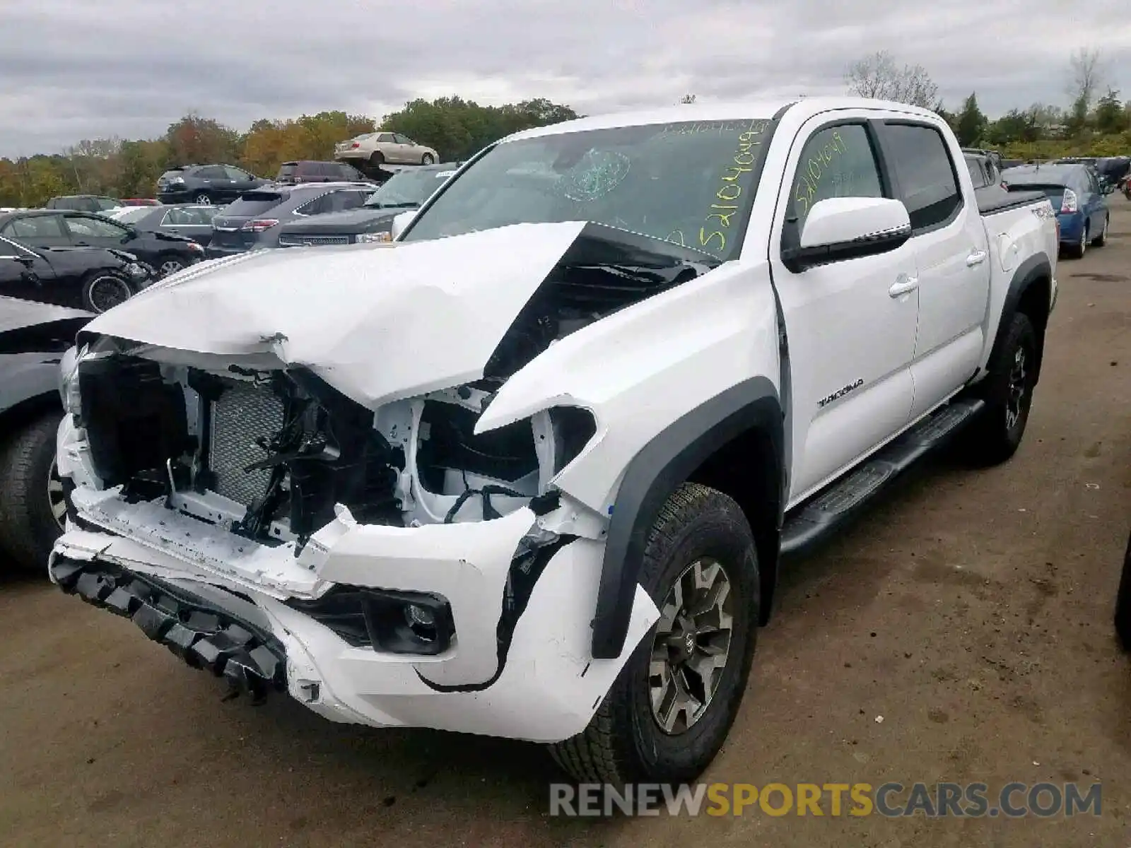 2 Photograph of a damaged car 3TMCZ5AN1KM276620 TOYOTA TACOMA DOU 2019