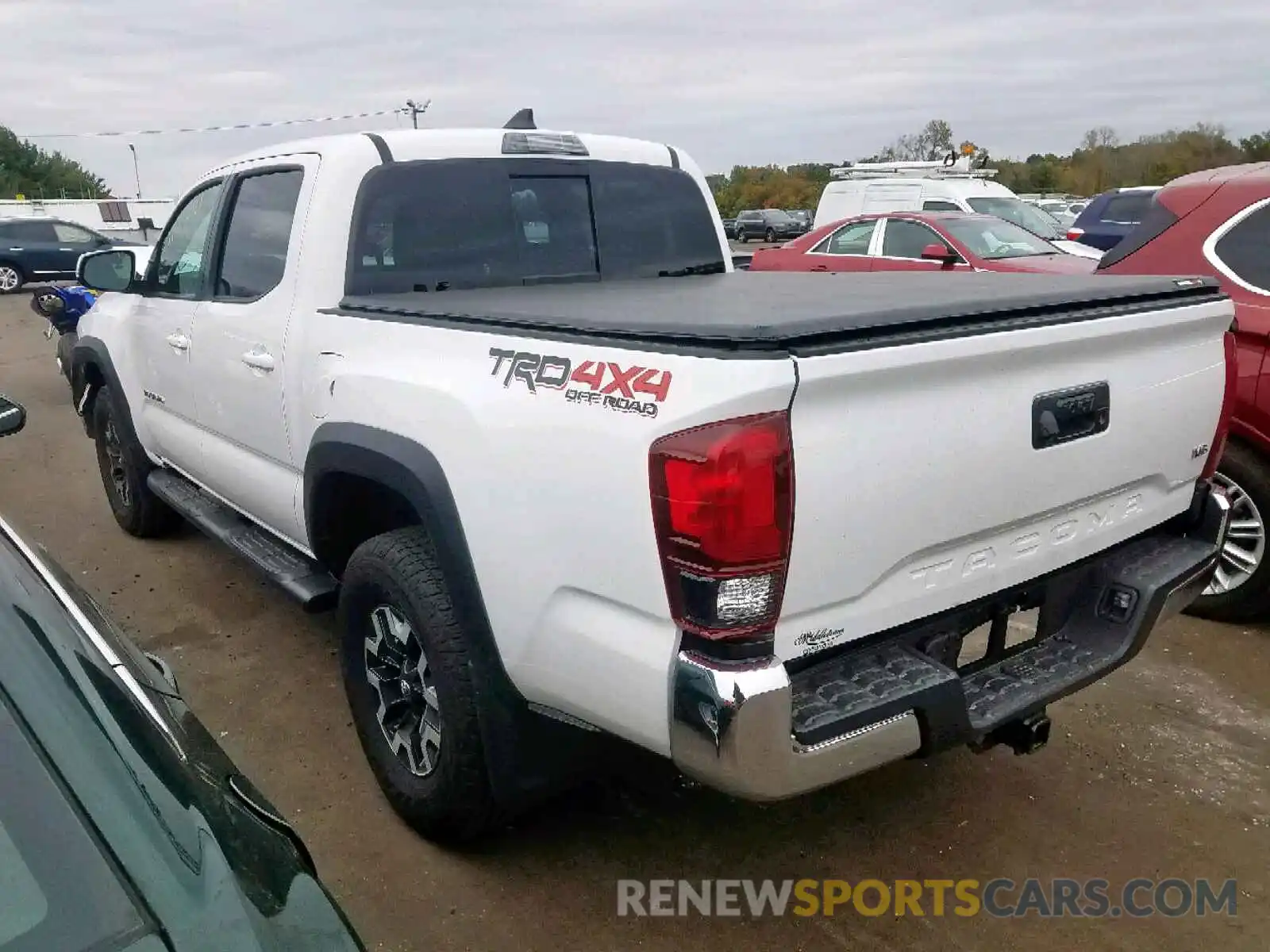 3 Photograph of a damaged car 3TMCZ5AN1KM276620 TOYOTA TACOMA DOU 2019