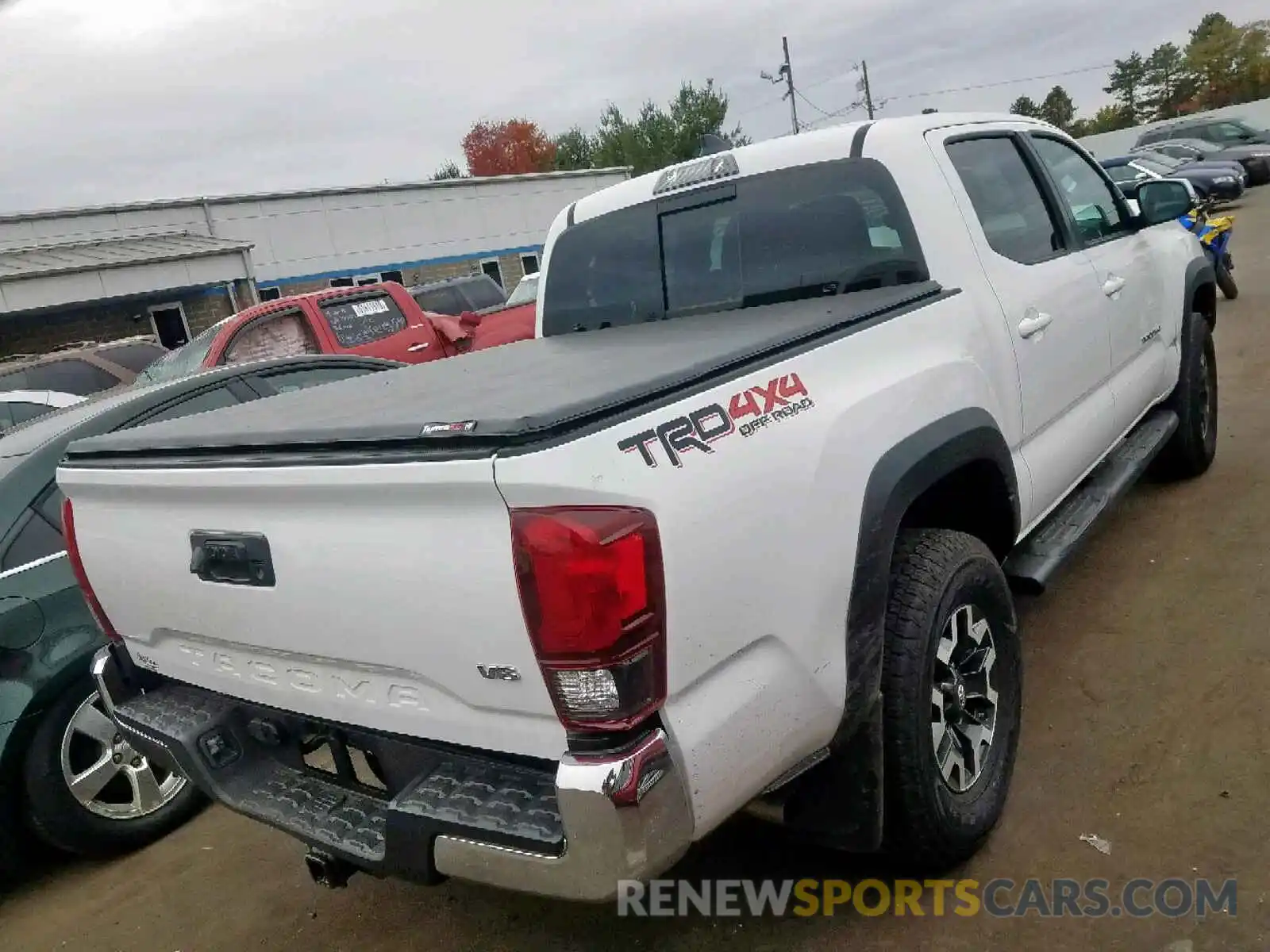 4 Photograph of a damaged car 3TMCZ5AN1KM276620 TOYOTA TACOMA DOU 2019