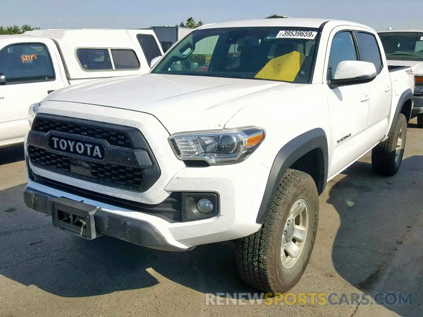 2 Photograph of a damaged car 3TMCZ5AN2KM194475 TOYOTA TACOMA DOU 2019