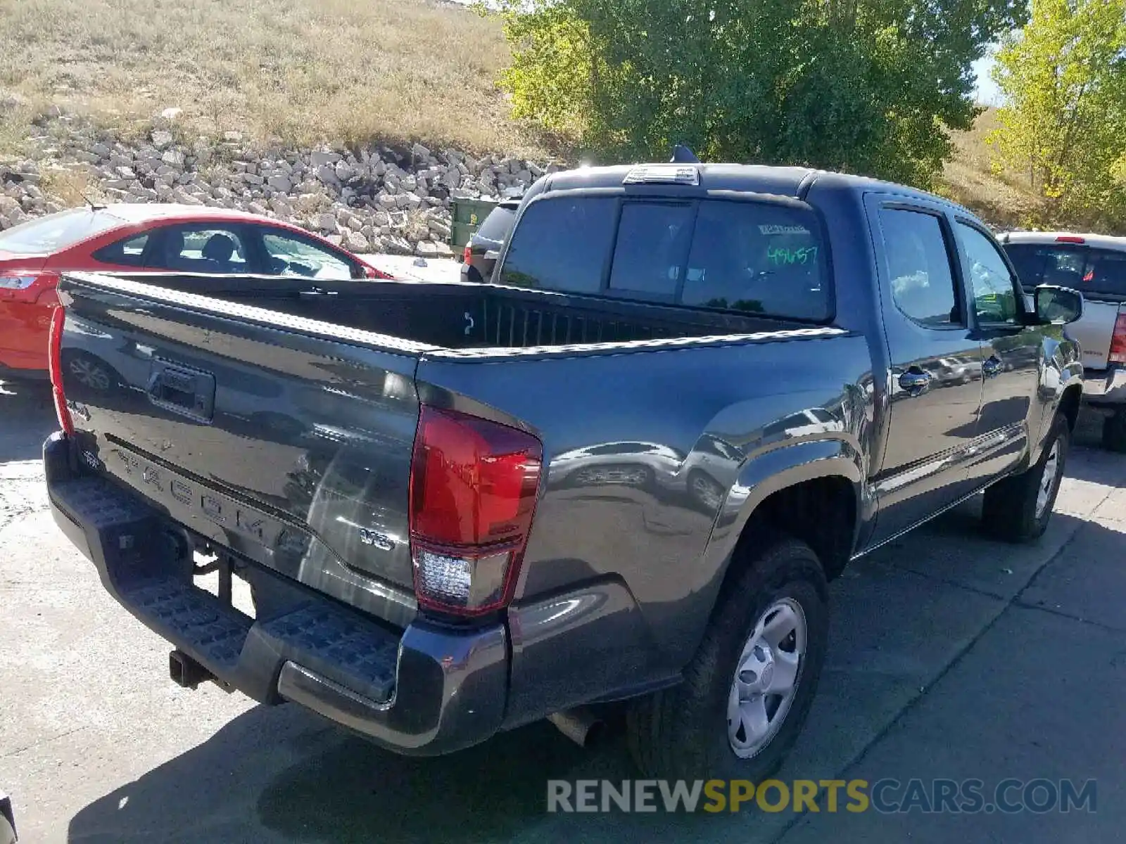 4 Photograph of a damaged car 3TMCZ5AN2KM213834 TOYOTA TACOMA DOU 2019