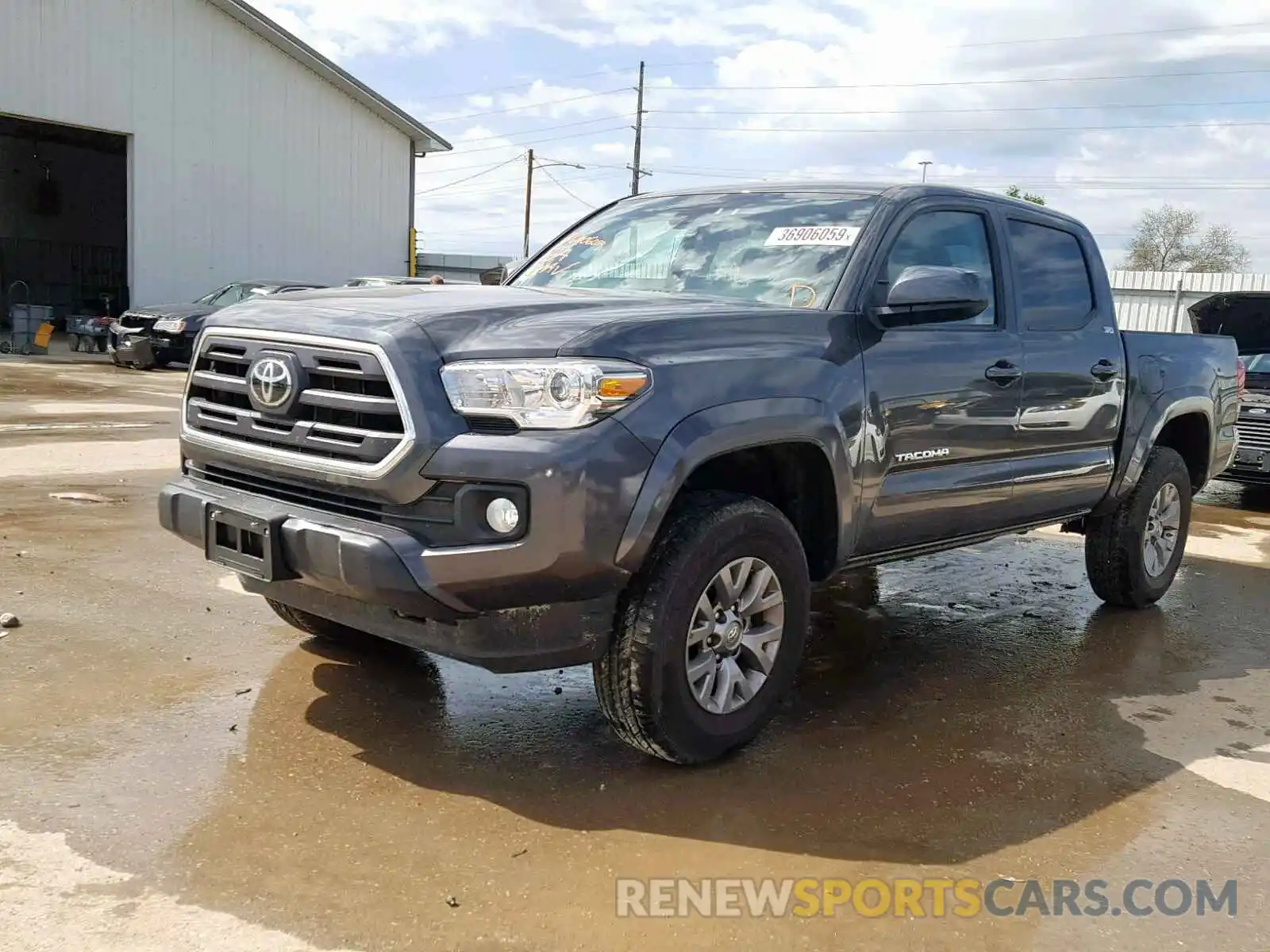 2 Photograph of a damaged car 3TMCZ5AN2KM223649 TOYOTA TACOMA DOU 2019