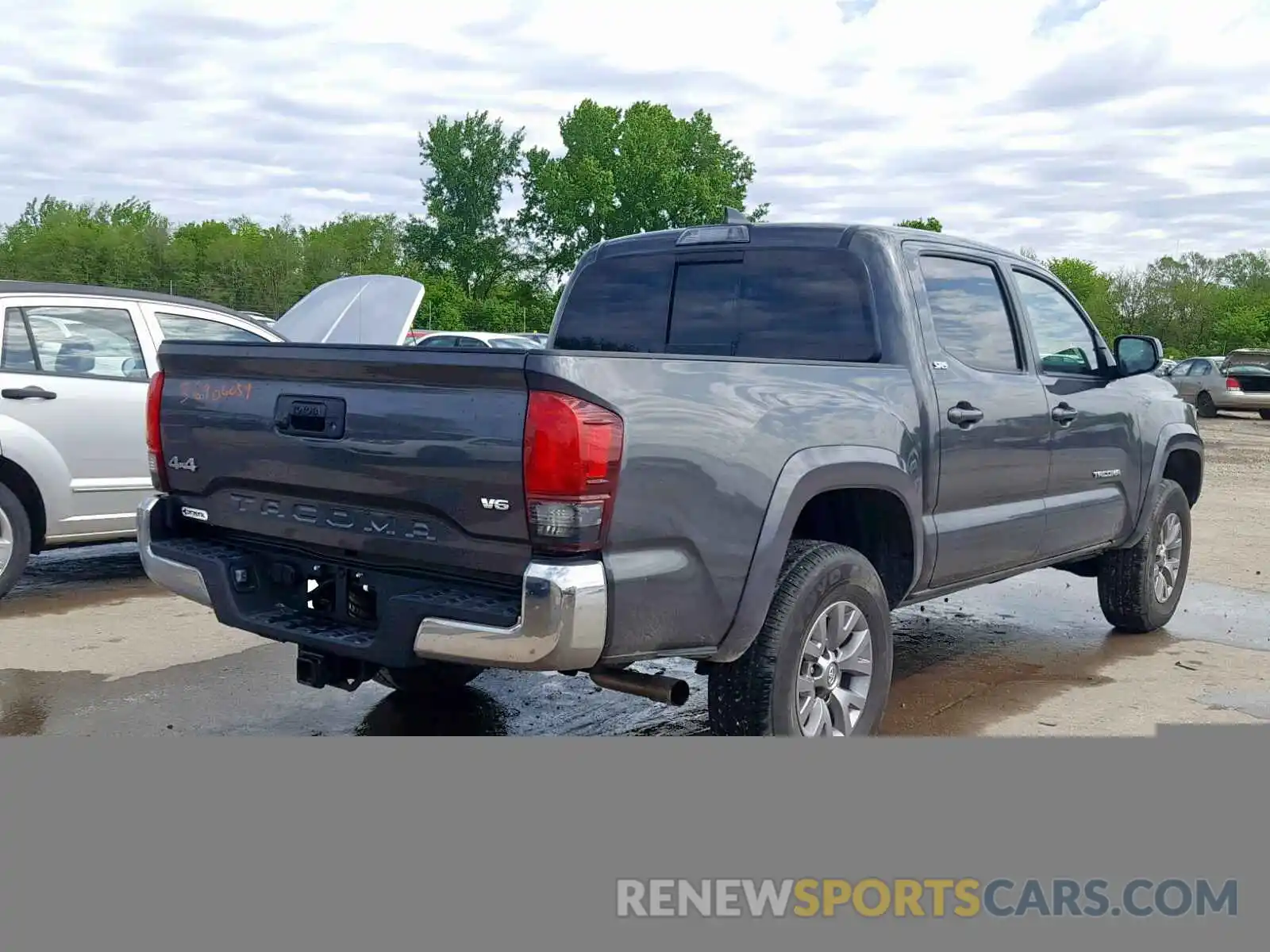 4 Photograph of a damaged car 3TMCZ5AN2KM223649 TOYOTA TACOMA DOU 2019