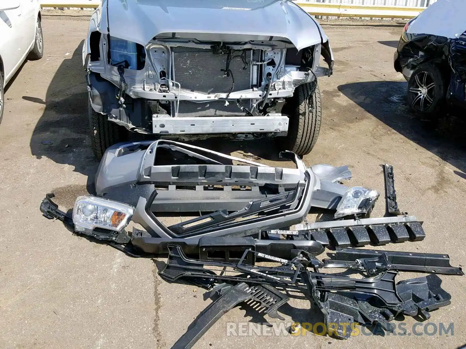 9 Photograph of a damaged car 3TMCZ5AN2KM227961 TOYOTA TACOMA DOU 2019