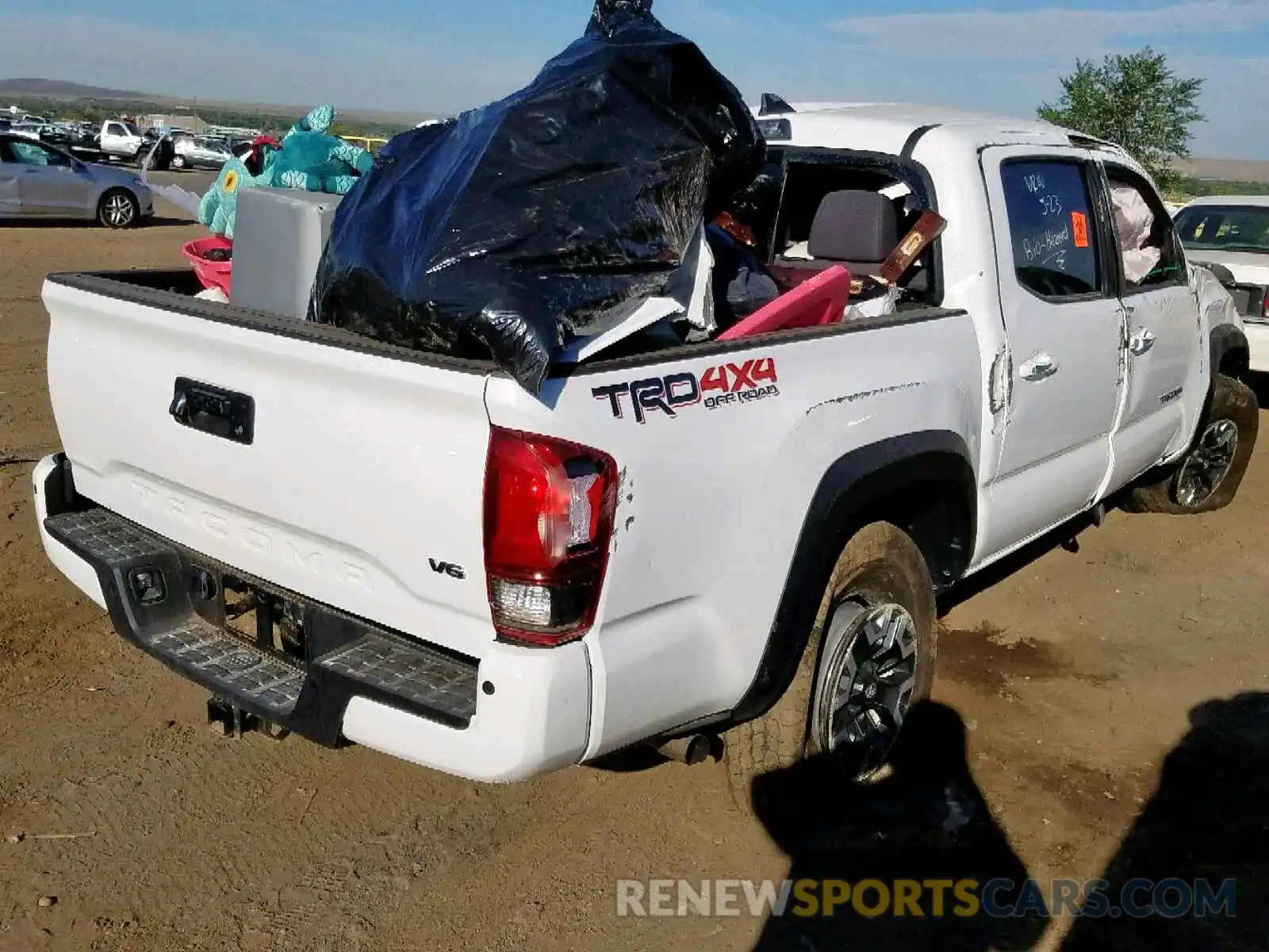 4 Photograph of a damaged car 3TMCZ5AN2KM237647 TOYOTA TACOMA DOU 2019