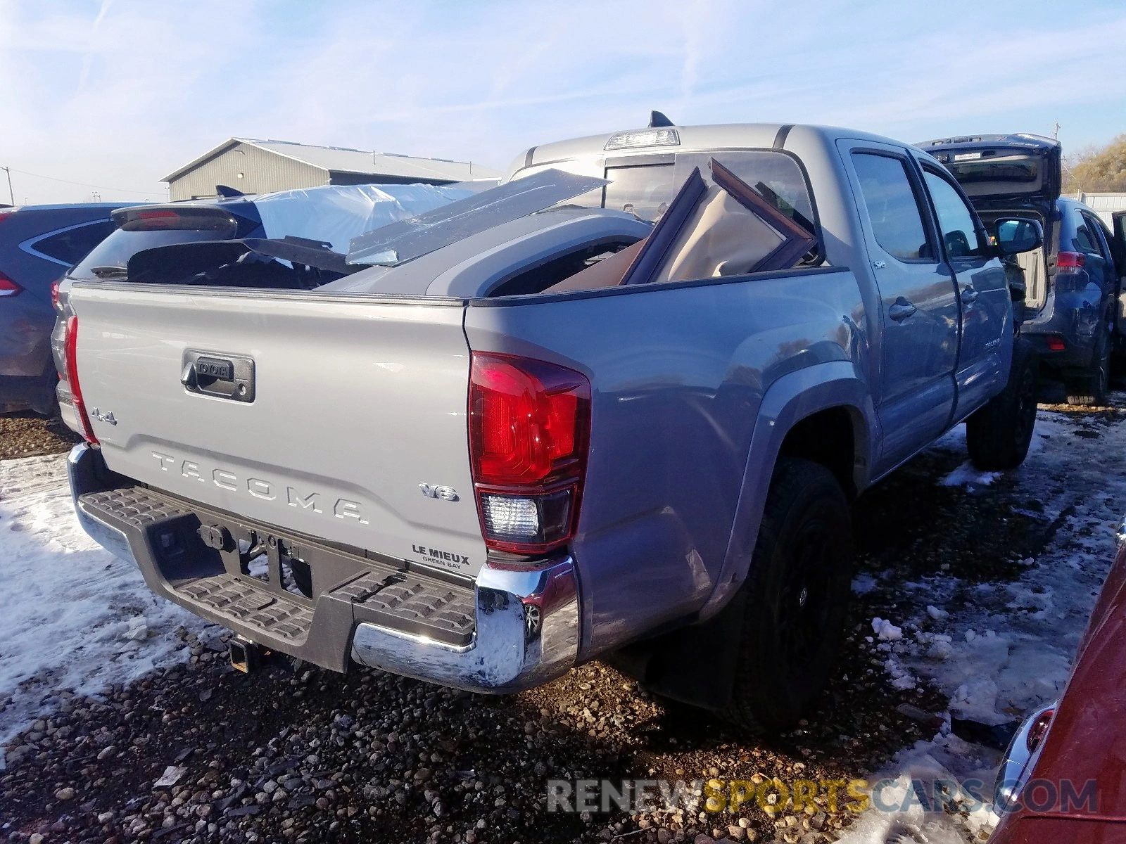 4 Photograph of a damaged car 3TMCZ5AN3KM205001 TOYOTA TACOMA DOU 2019