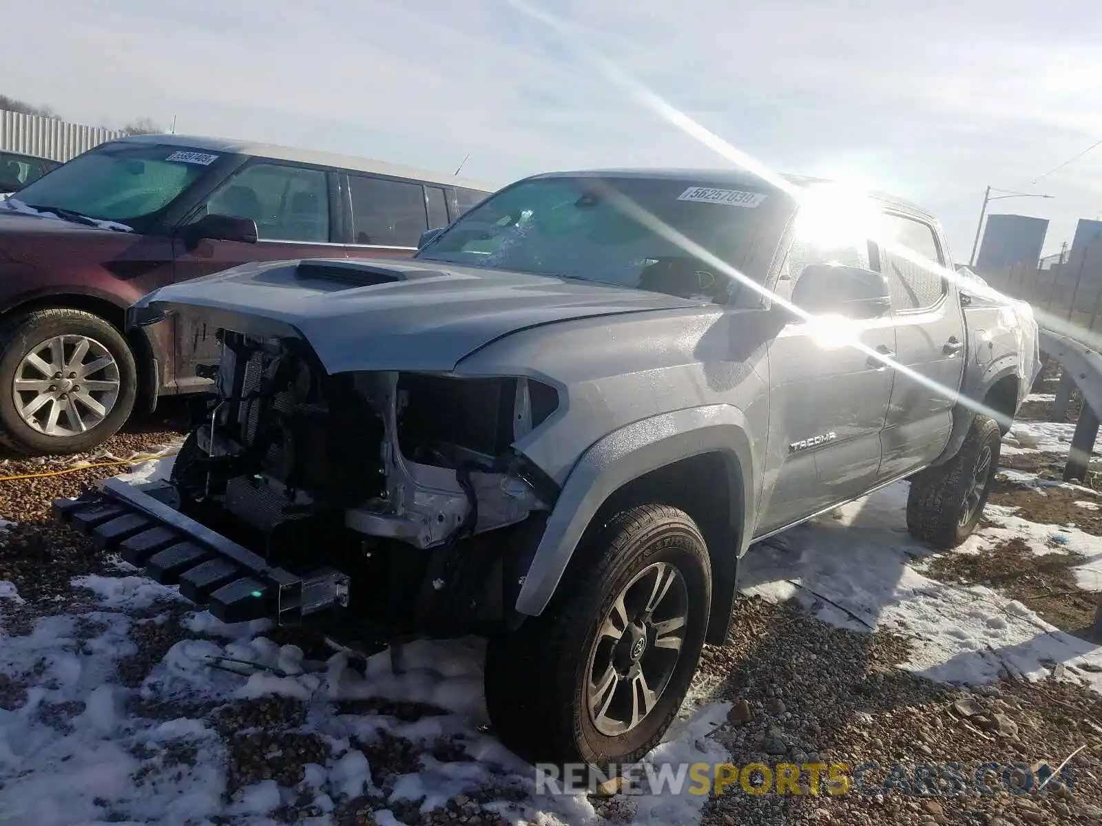 2 Photograph of a damaged car 3TMCZ5AN3KM246146 TOYOTA TACOMA DOU 2019