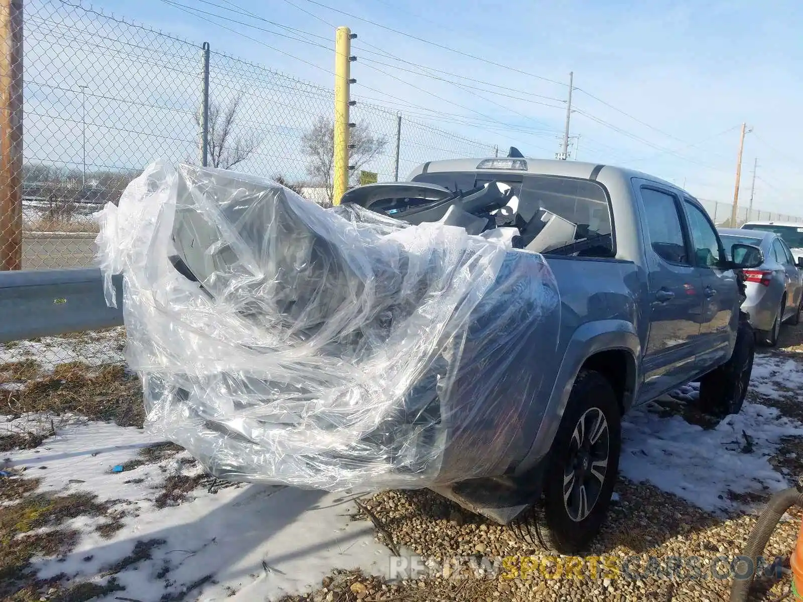 4 Photograph of a damaged car 3TMCZ5AN3KM246146 TOYOTA TACOMA DOU 2019